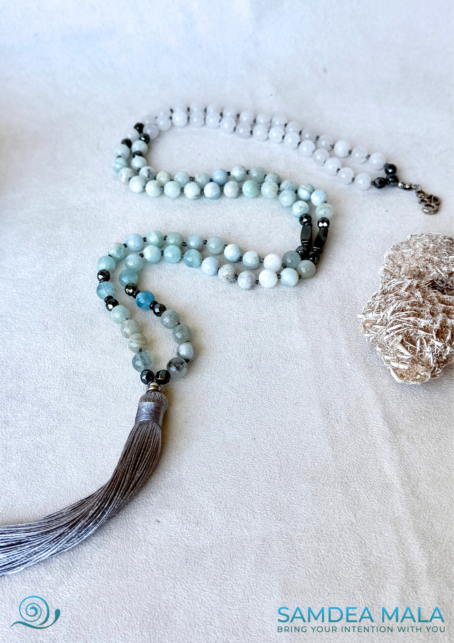 108 Mala beads for meditation in Aquamarine and White Jade with Tassel for peace and presence - OM charm