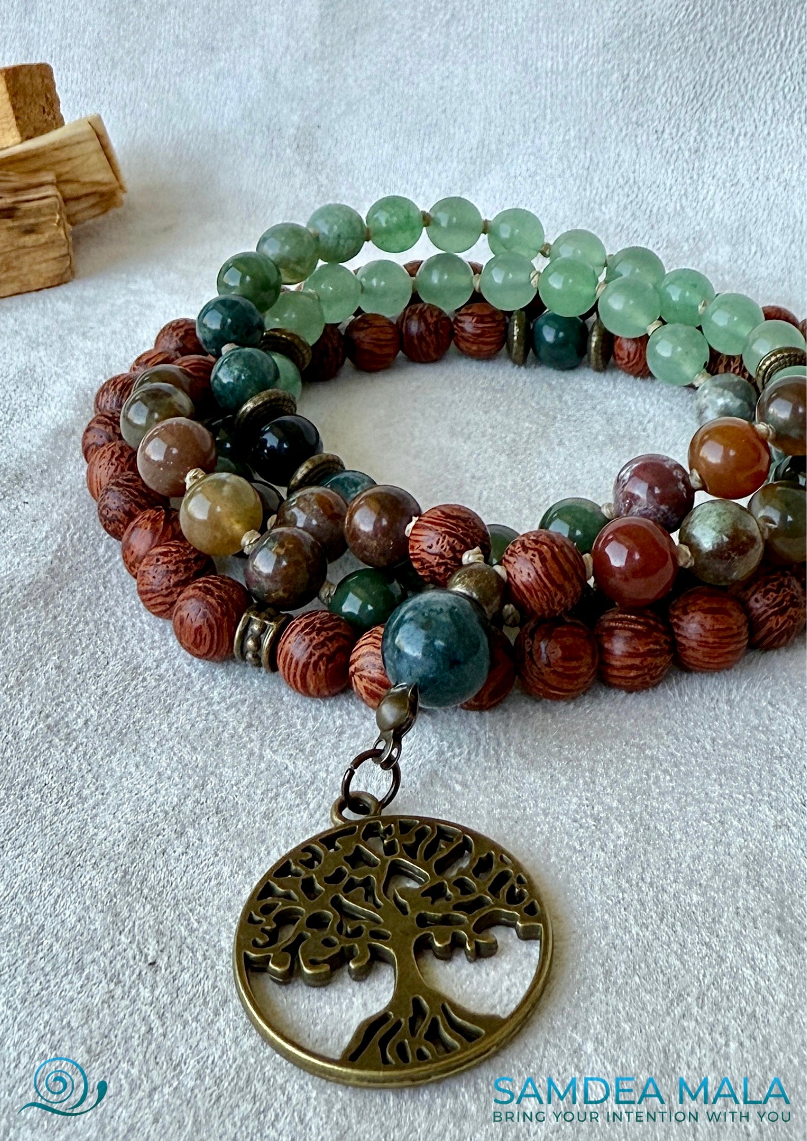 Mala fo man in dragon wood, Indian Agate and Aventurine - 108 bead mala styled for meditation and grounding - with tree of life pendant. Close-up.