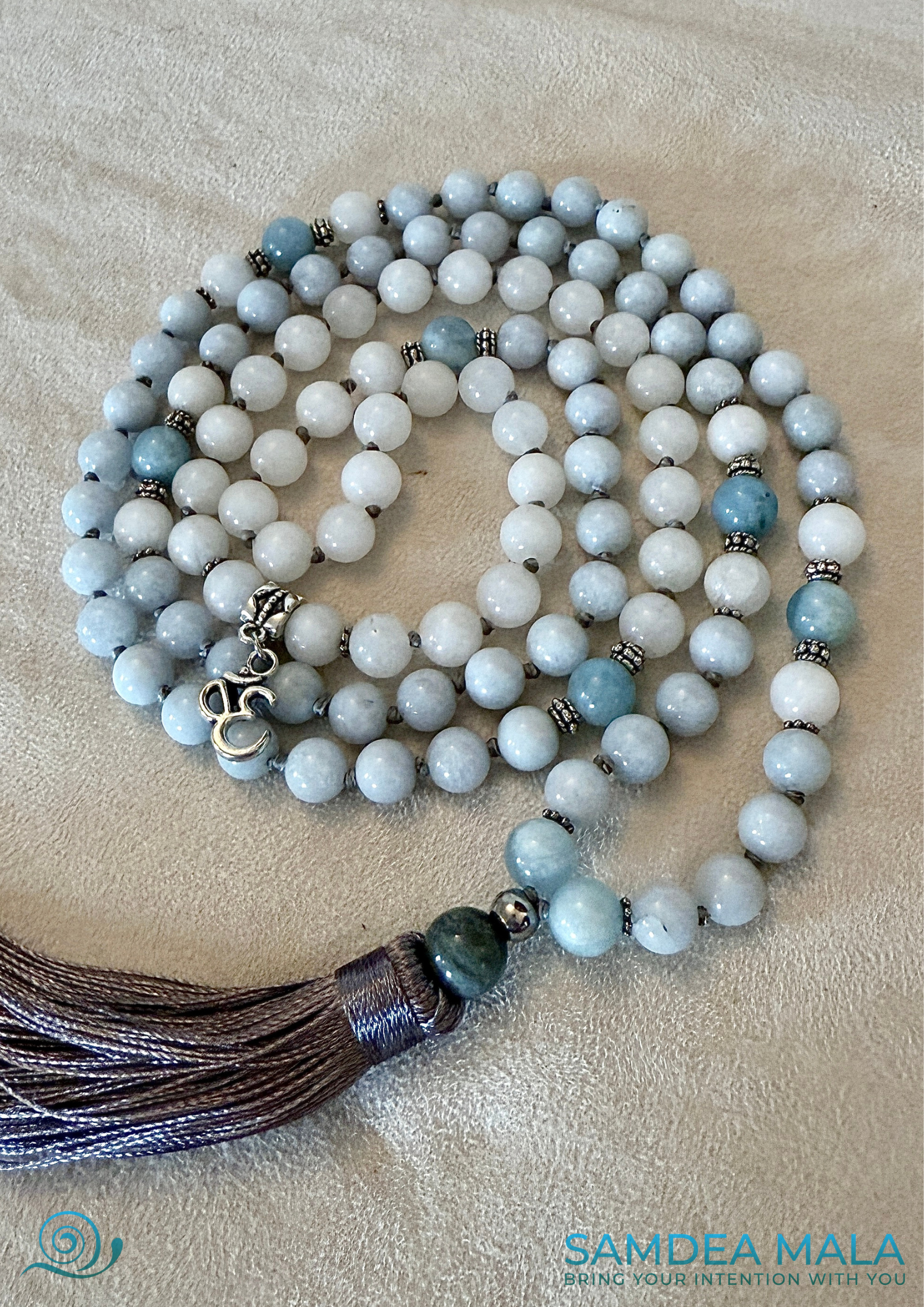 Blue Mala beads in Aquamarine and white jade tones for mindful living - om charm