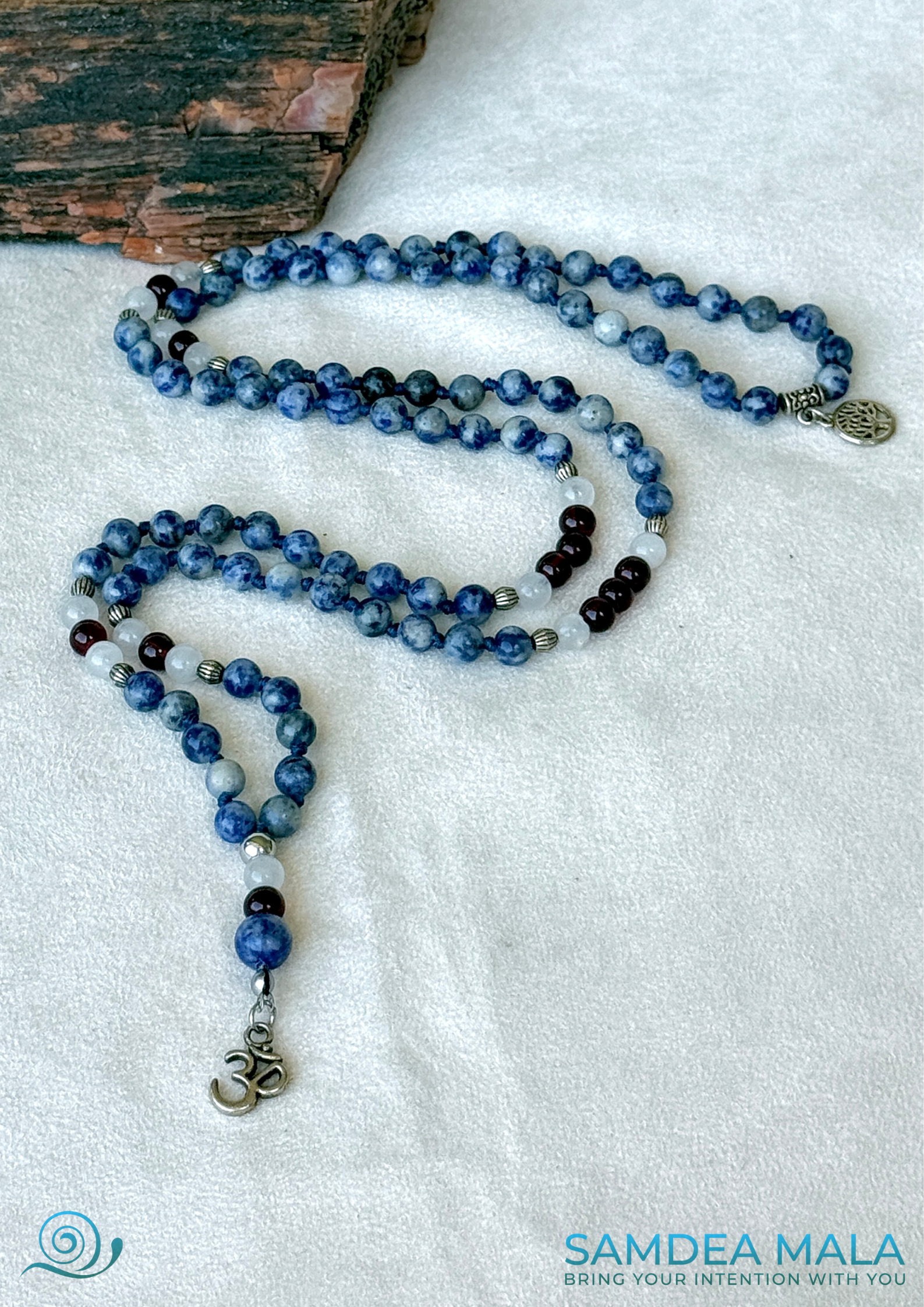 Blue Mala necklace in Jasper, White Jade & Garnet – Handmade Meditation Necklace with om pendant and tree of life charm