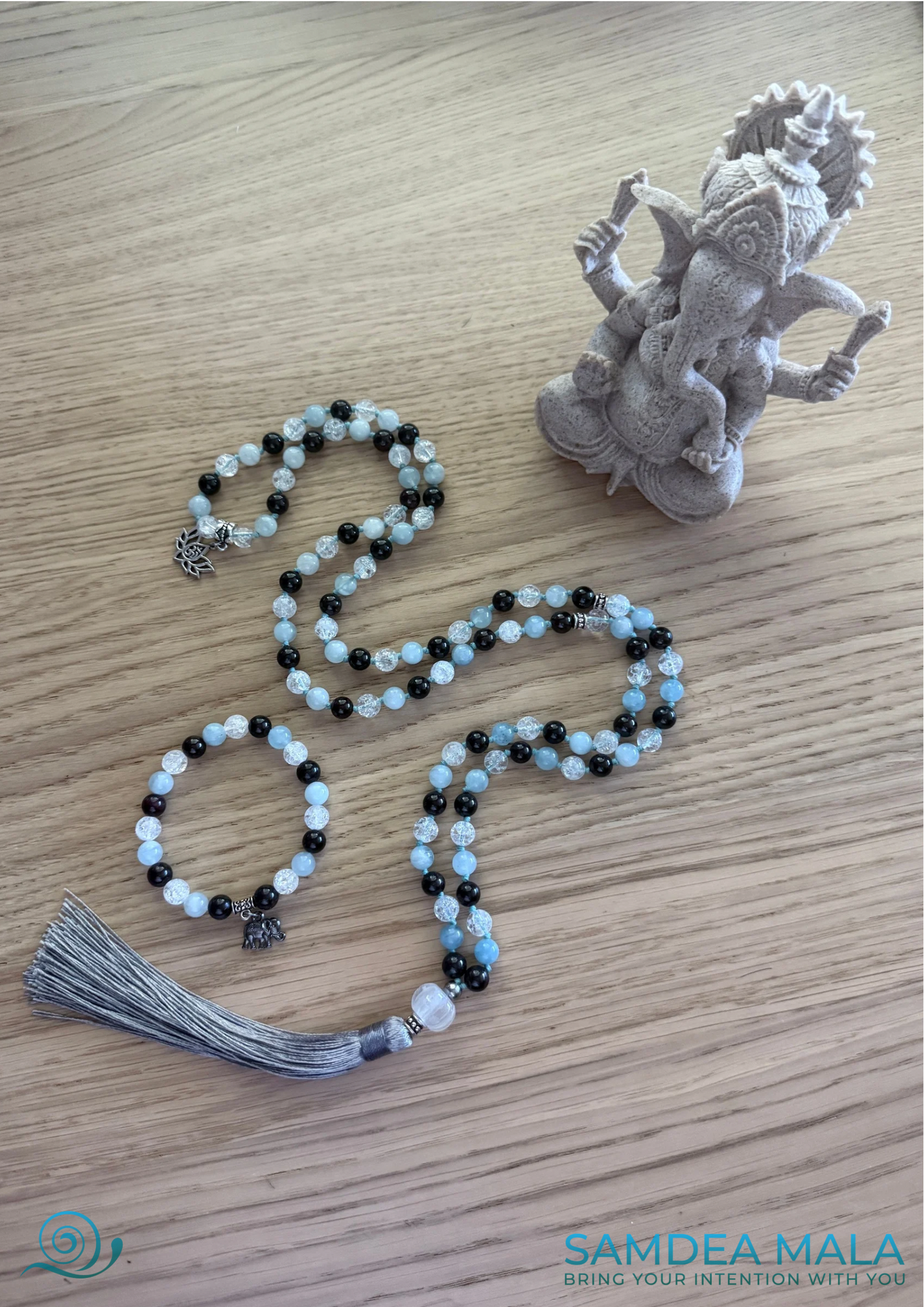 Clear quartz accent beads on spiritual gemstone mala for mindfulness and mala bracelet with elephant charm