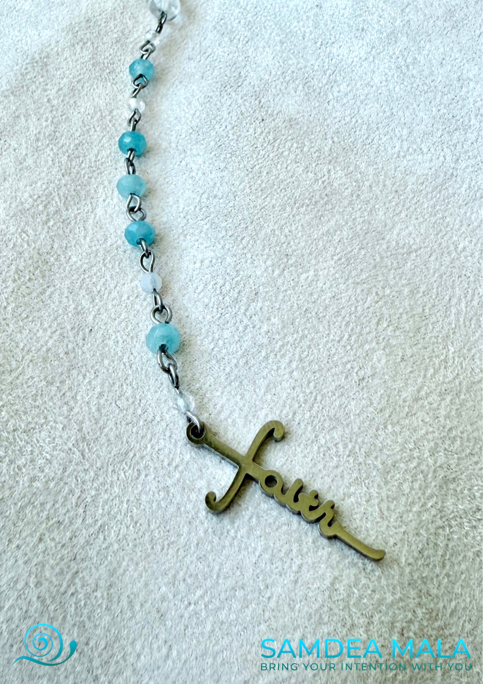 Close-up of Cross of Catholic rosary in stainless steel Roman Catholic cross Faith