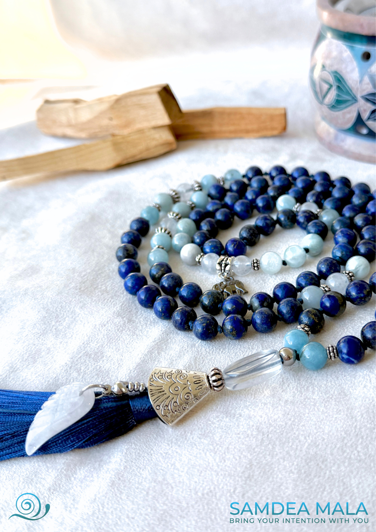 Close-up of lapis lazuli beads in the Mala for Libra zodiac sign, showing natural color and detailed knotting