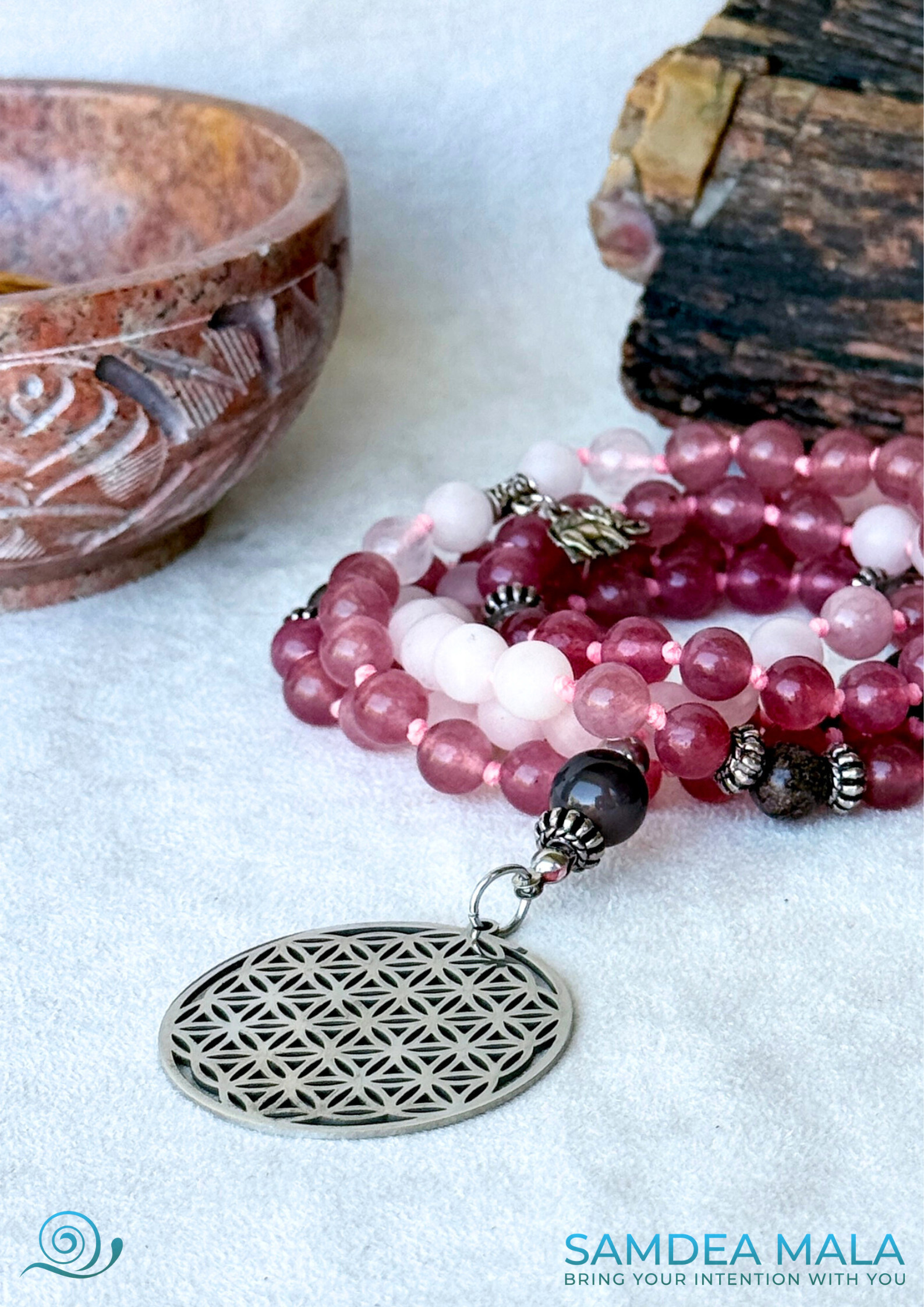 Close up of Samdea Mala necklace with rose quartz and strawberry quartz – 108 beads for healing and self-love
