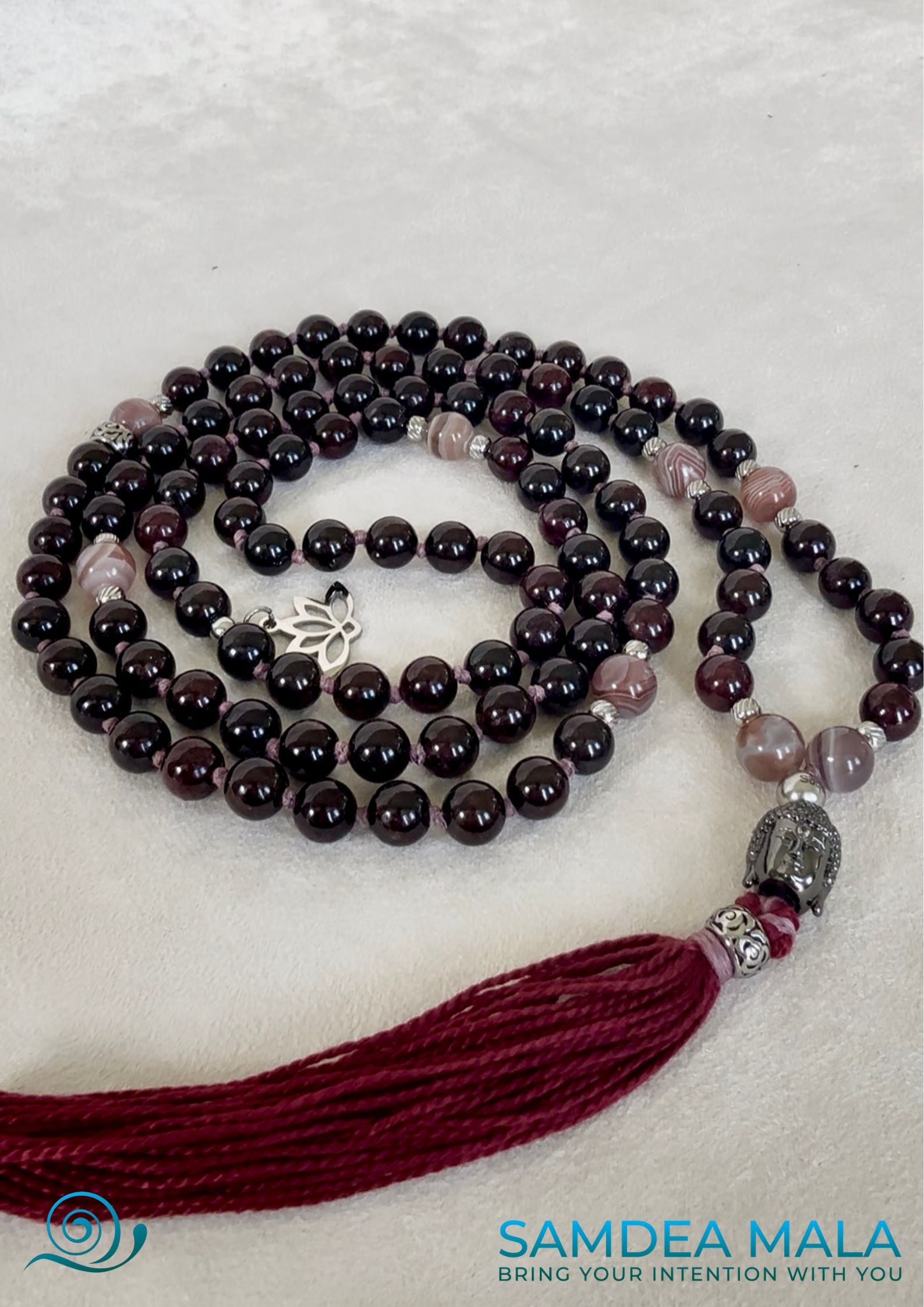 108 prayer beads for a spiritual gift. Custom mala with tassel; purple, bordeaux mala beads with Buddha and lotus charm, for protection and light.