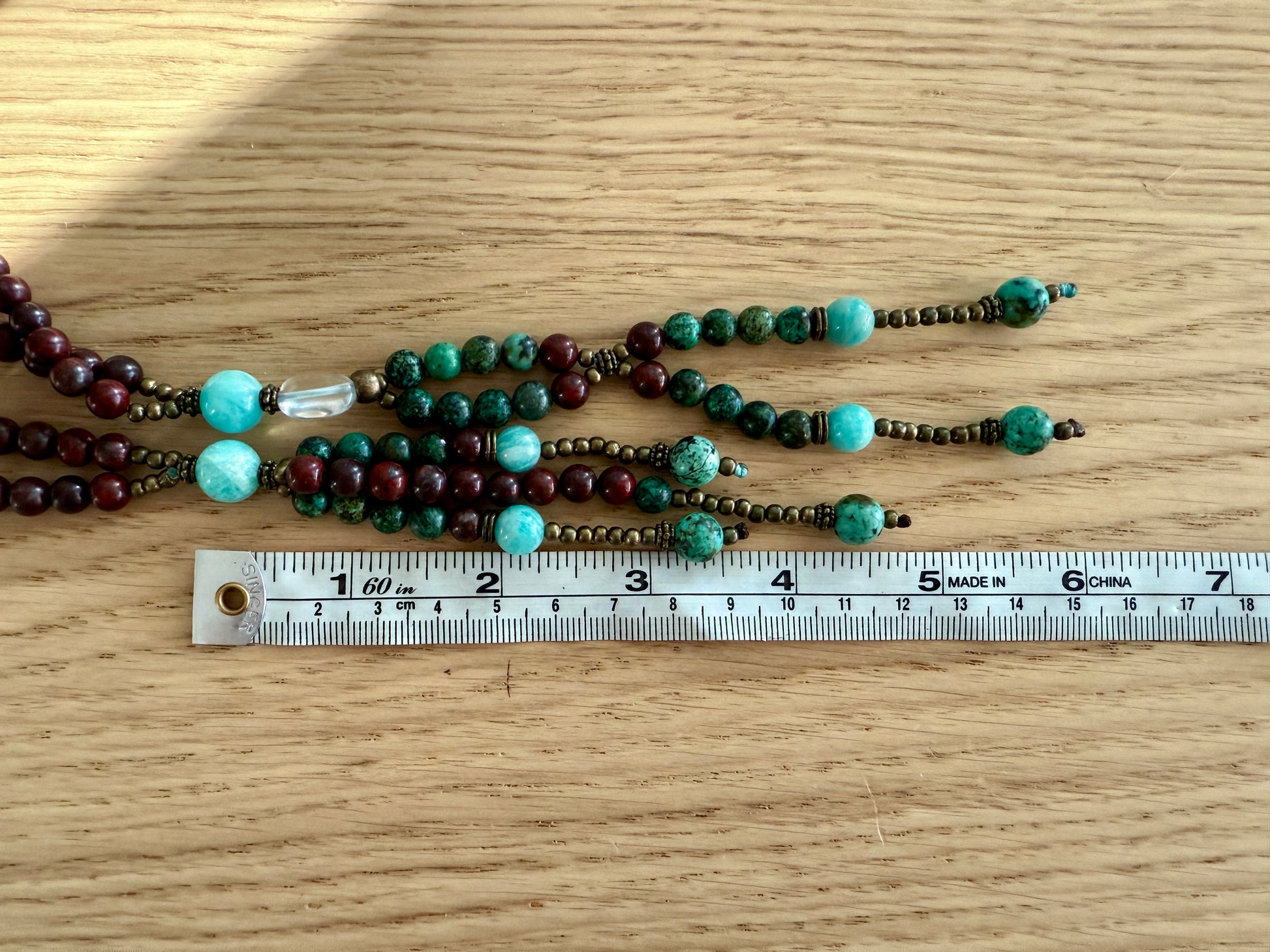 Dimensions of red jasper juzu tassel prayer beads – handmade Japanese Buddhist mala for chanting Nam Myoho Renge Kyo mantra and spiritual practice.