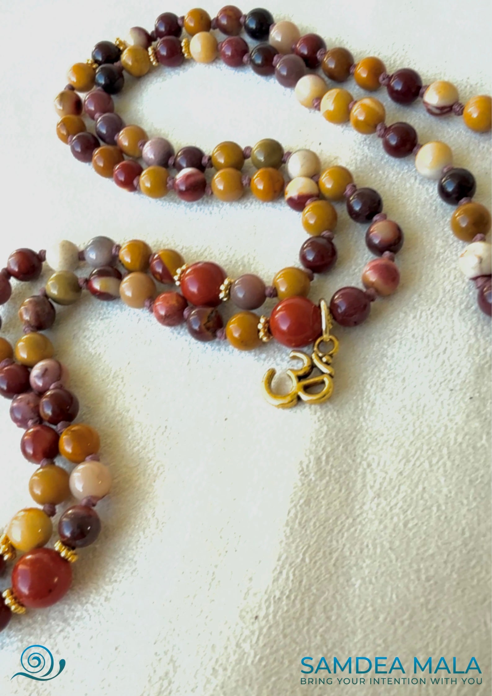 Handmade 108 bead mala for transformation and balance - close-up