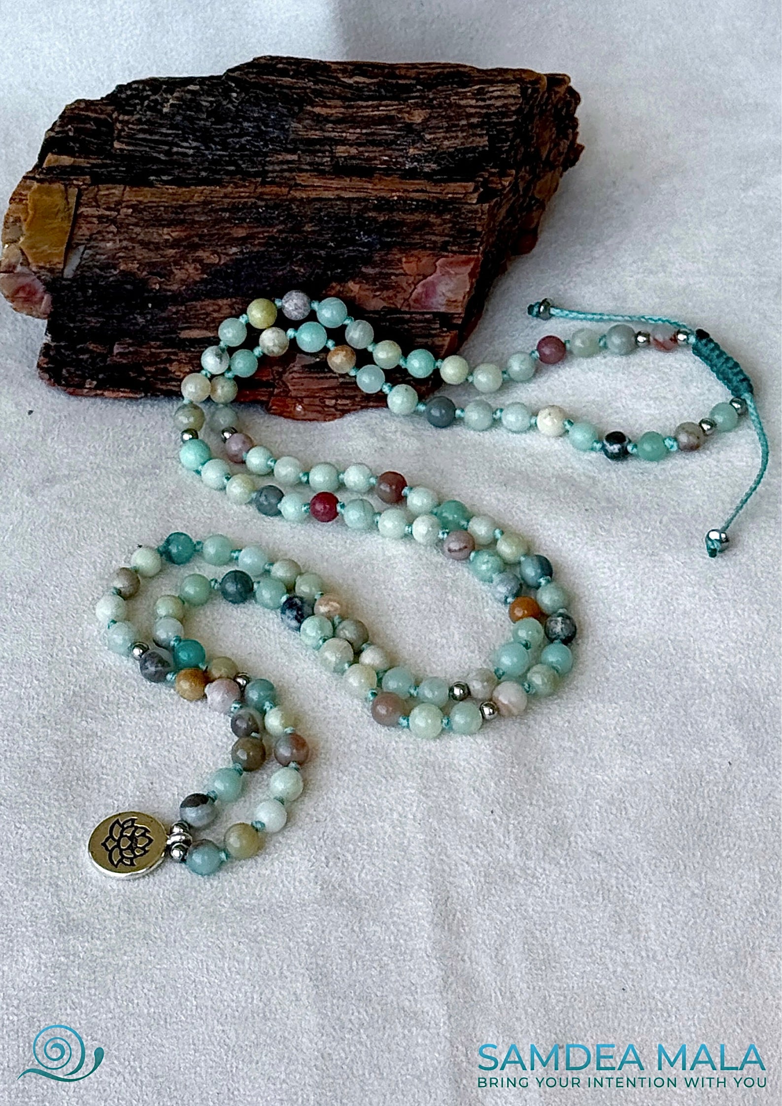 Handmade meditation mala bracelet in amazonite with macrame closure and small lotus charm – a spiritual accessory for calm, balance, and daily intention