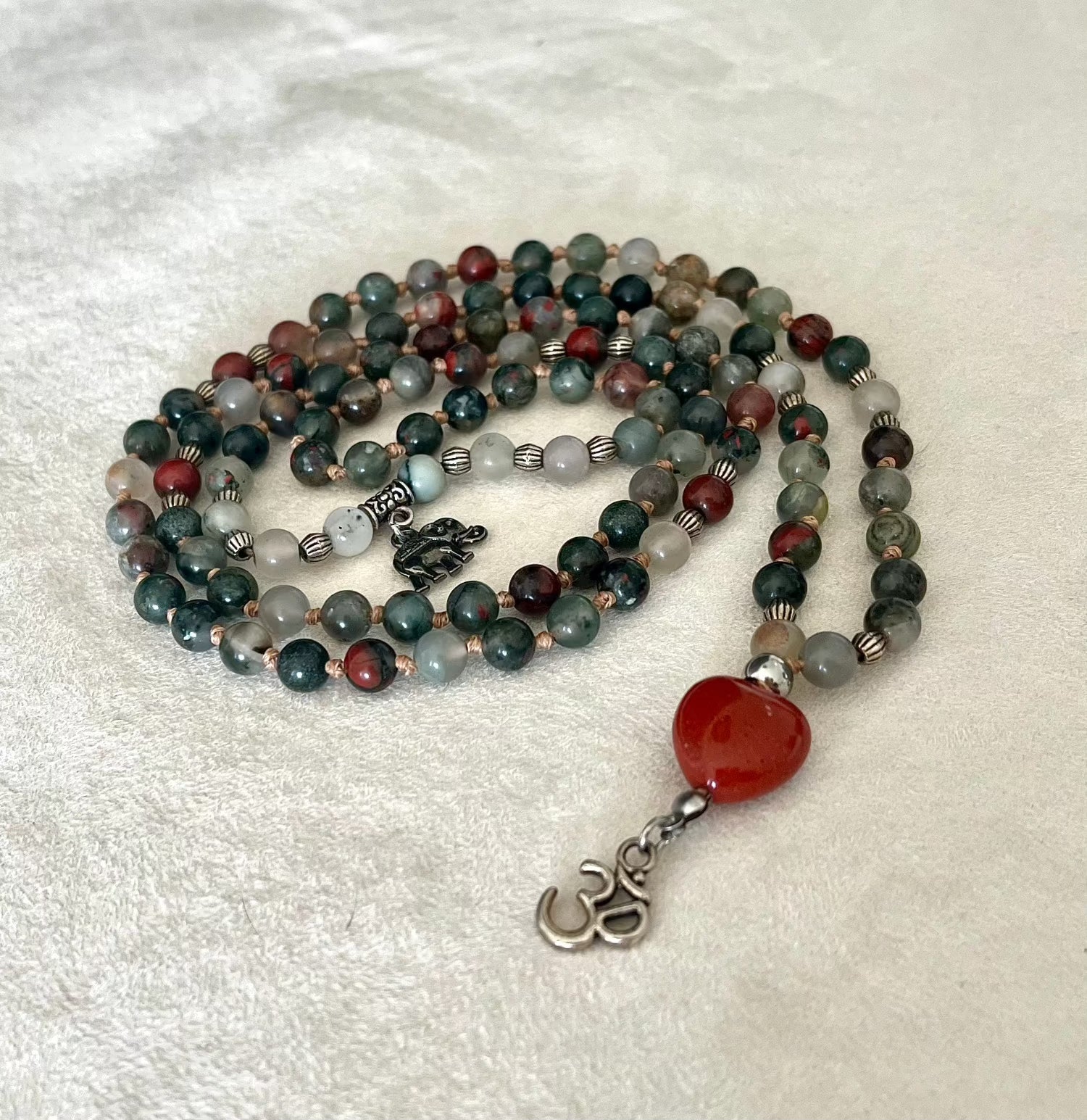 Handmade mala for spiritual warriors, Mala in Heliotrope with a Red Jasper Heart and a small om charm