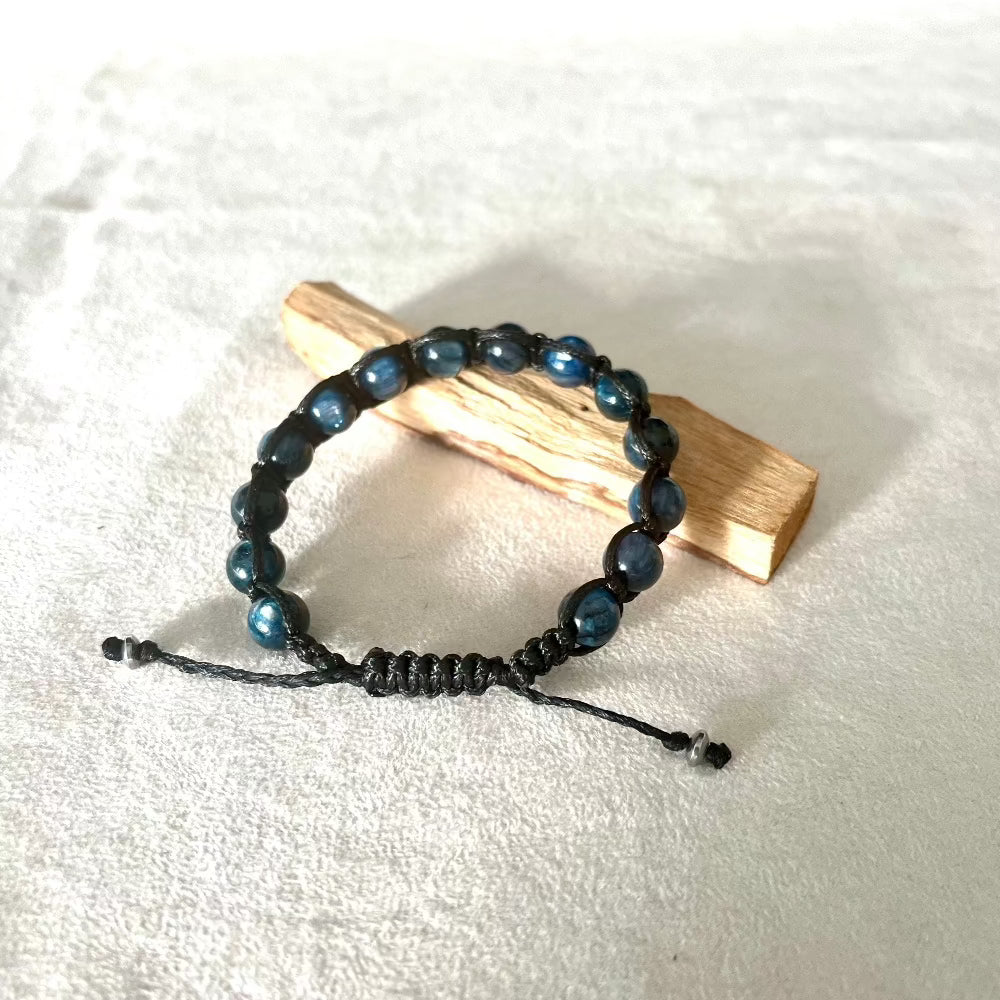 Tibetan Tamashii-Style Bracelet in Kyanite - meditation bracelet, spiritual bracelet for mindful mediation. The bracelet is made with dark blue round beads and black string.