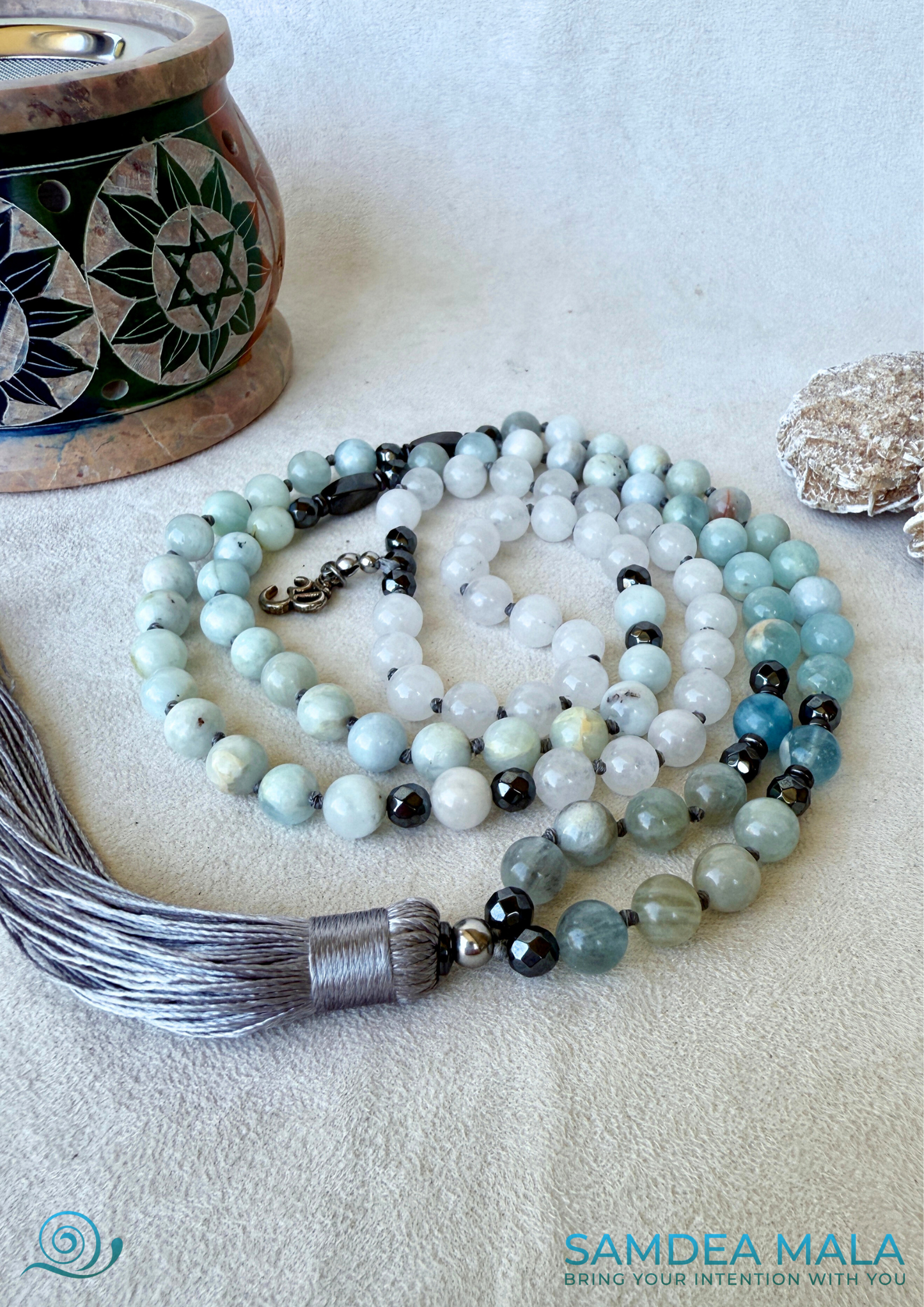 Mala beads in soft blue Aquamarine and white jade tones for mindful living - om charm
