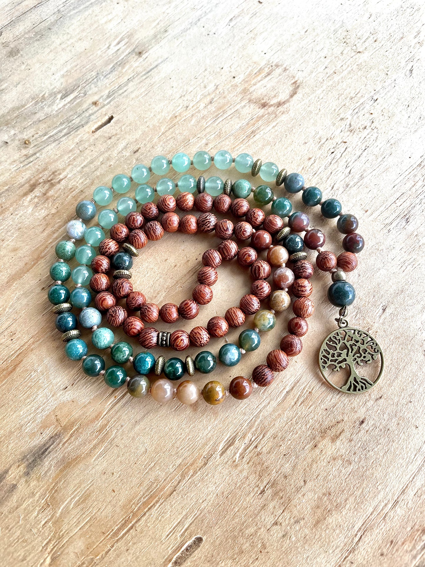 Mala for man in green aventurine, indian agate and dragon wood, finished with a tree of life pendant. Samdea mala
