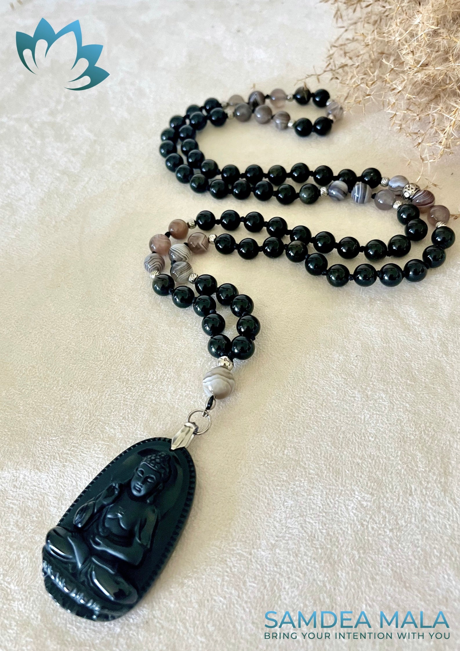 Mala in Obsidian and Botswana Agate - close up of Hand-knotted with Buddha pendant for meditation and protection by Samdea MalaSamdea Mala