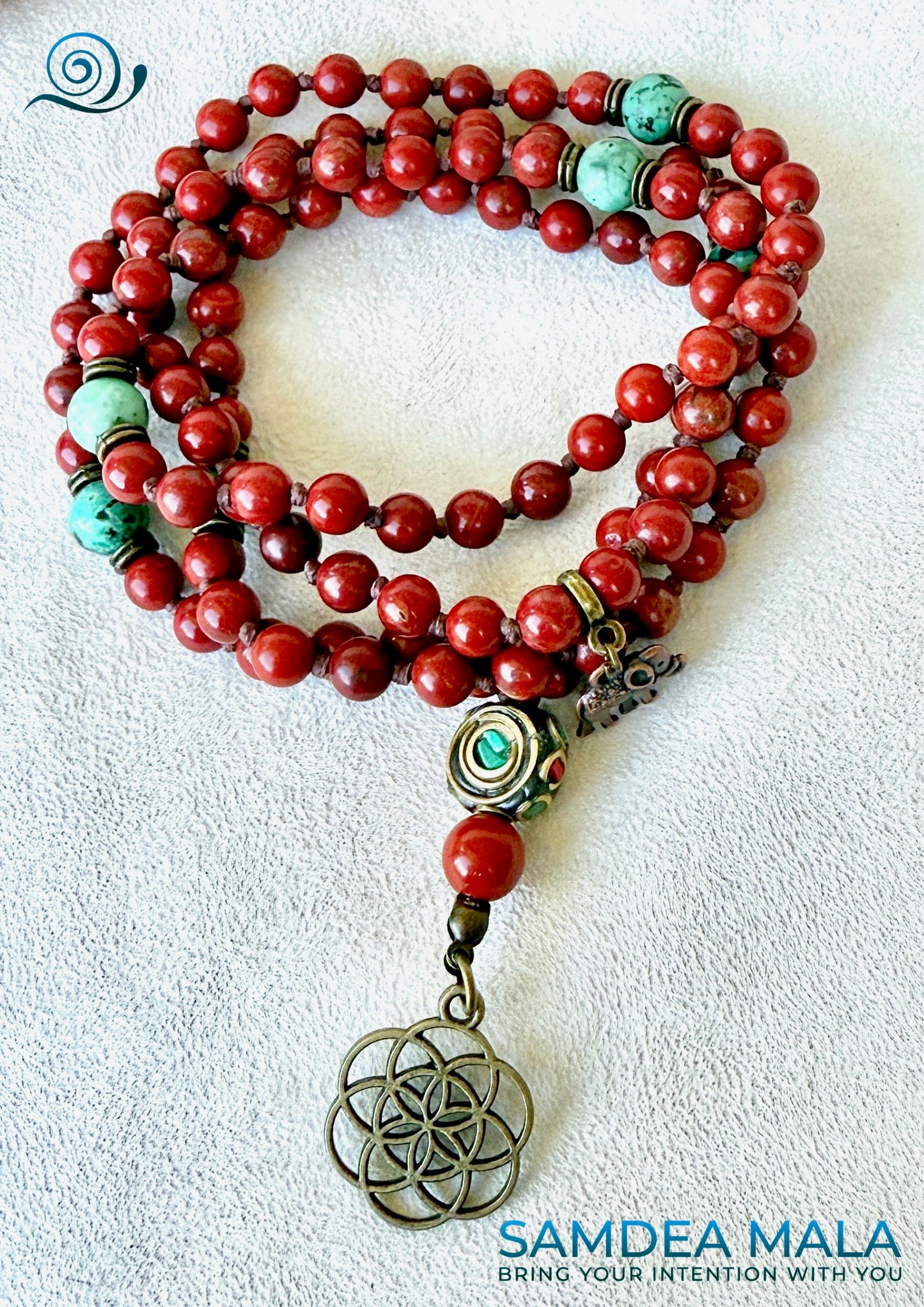 Mala necklace for meditation and grounding with seed of life pendant.