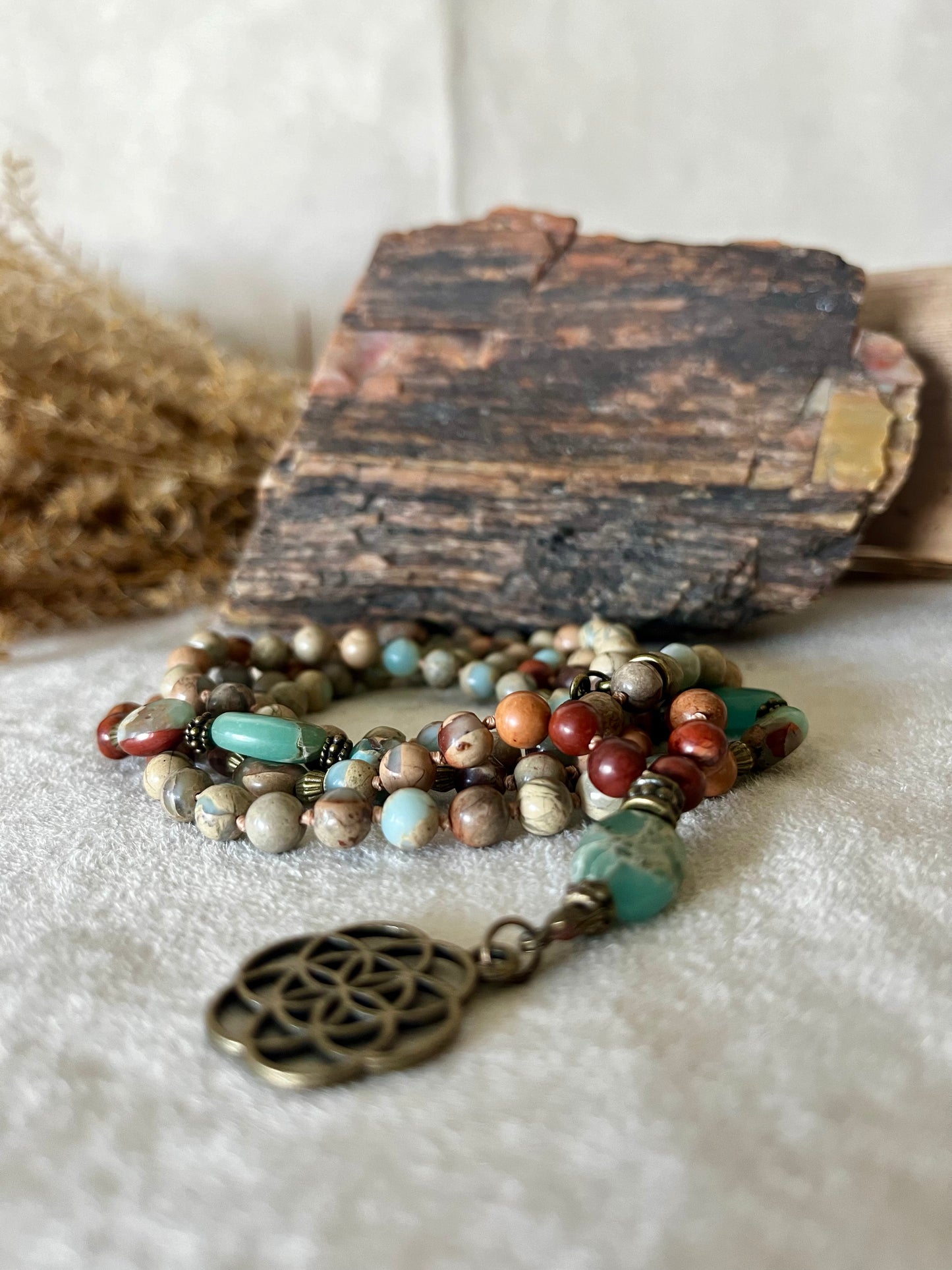 Aqua Terra Jasper mala for mindfulness and inner calm, with seed of life pendant