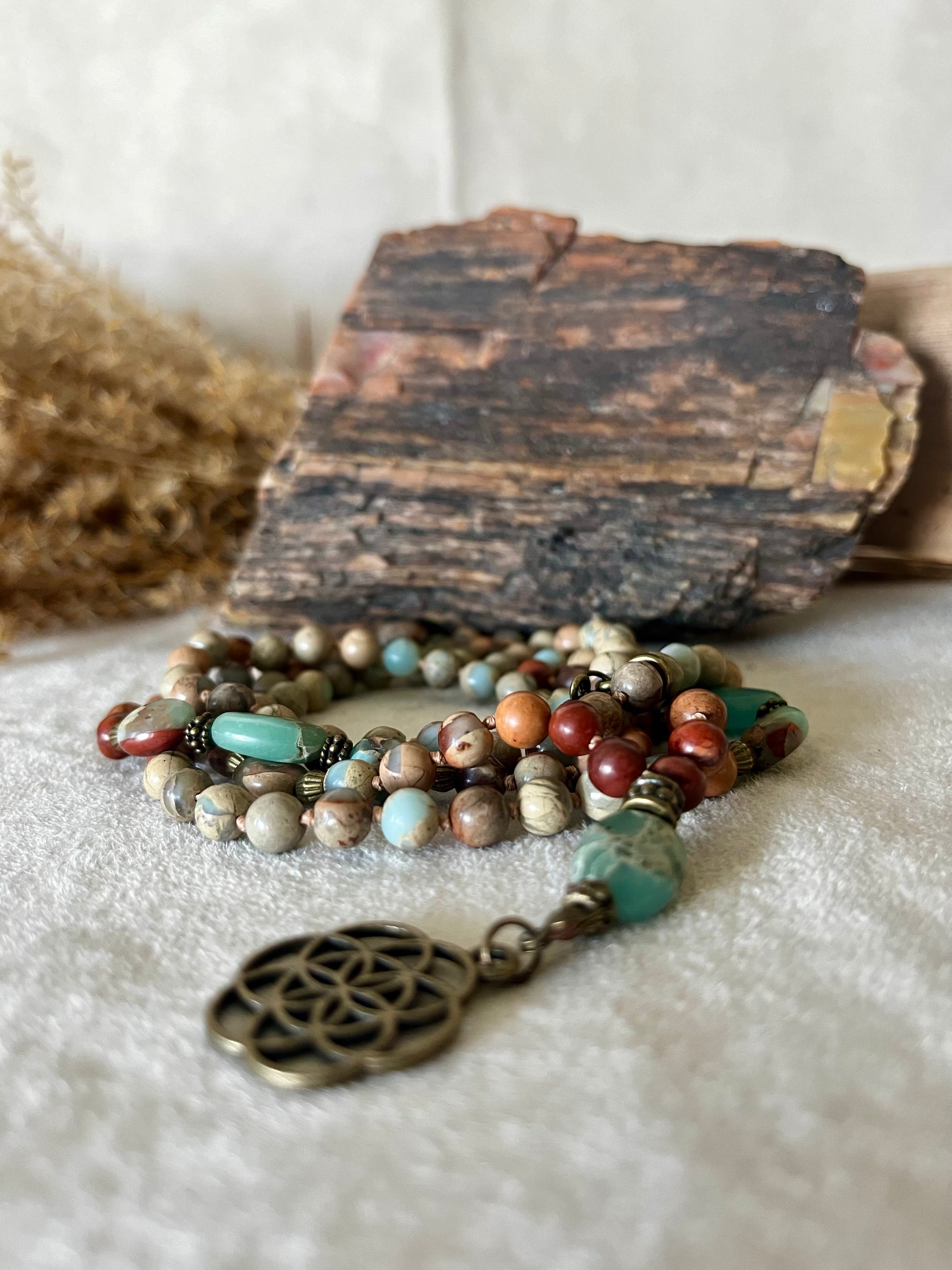 Aqua Terra Jasper mala for mindfulness and inner calm, with seed of life pendant