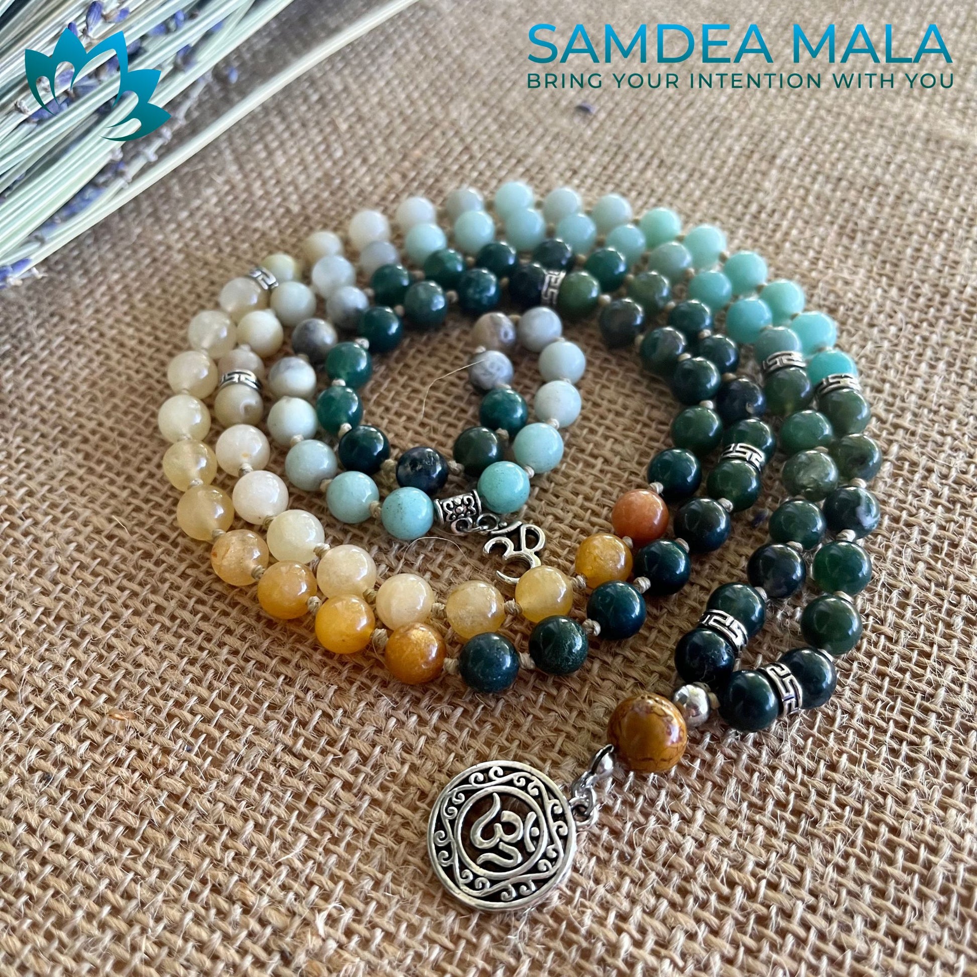 Samdea Mala custom mala personalized gemstones. Ma multicolor mala in green agate, amazonite and jade with om pendant and small charm