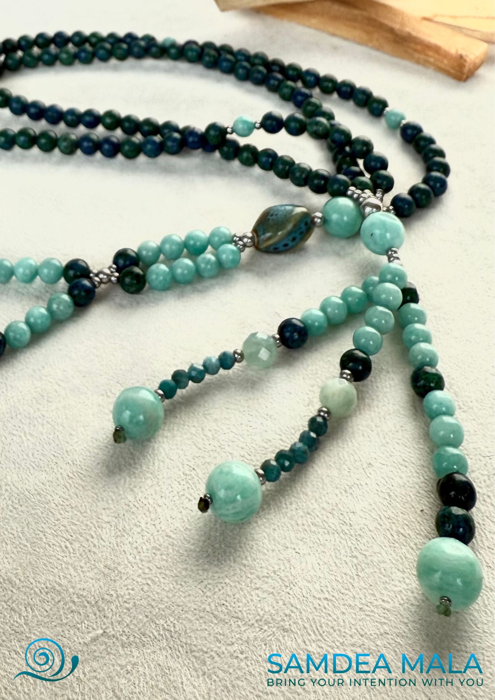 Close up Samdea Mala blue Juzu prayer beads. Japanese Buddhist Juzu Nichiren Nam myoho renge kyo. Handmade blue Juzu