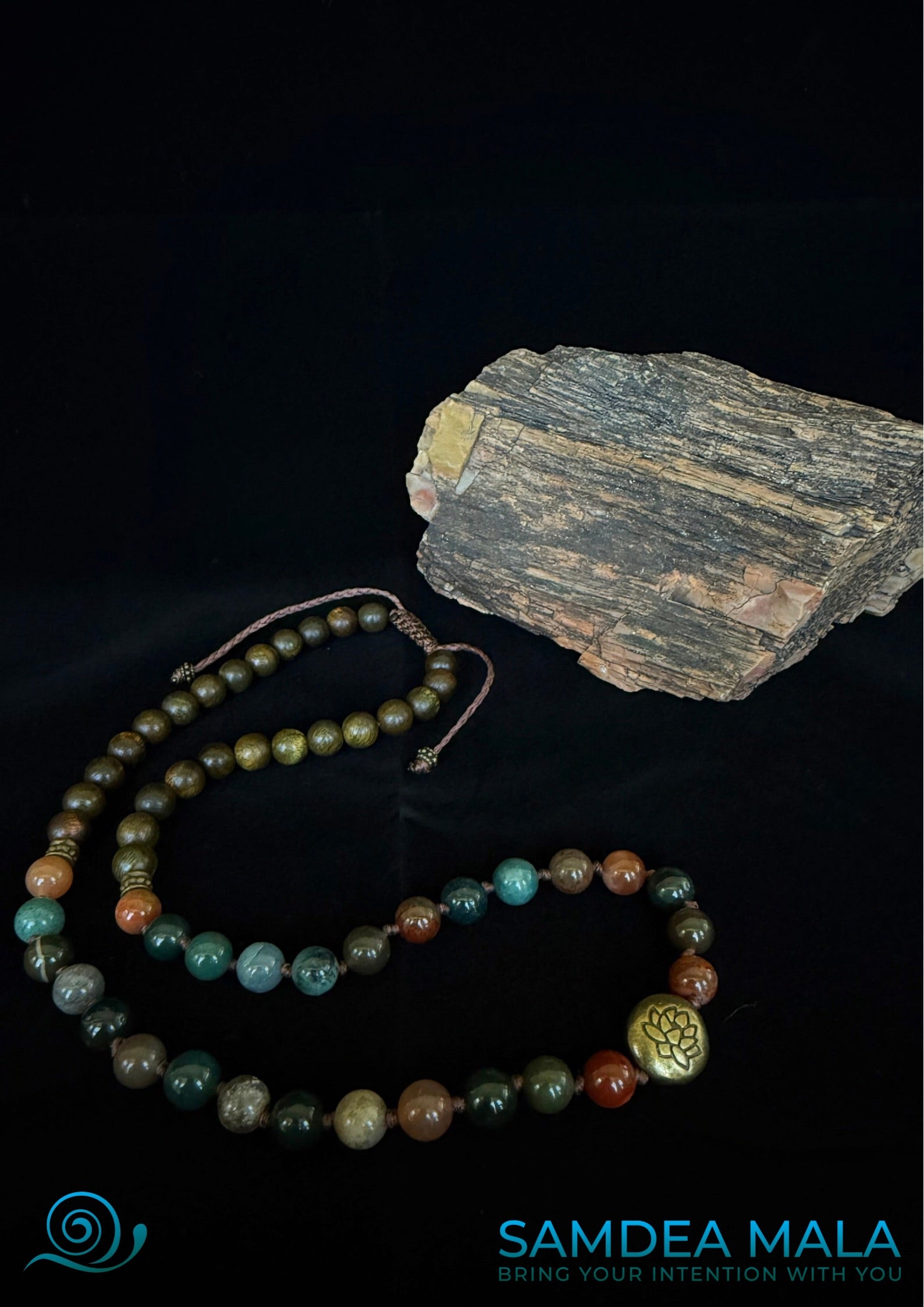 Mala bracelet used in daily mindfulness rituals. Multi round bracelet with grounding stones for emotional balance. Sandalwood mala bracelet worn as everyday accessory