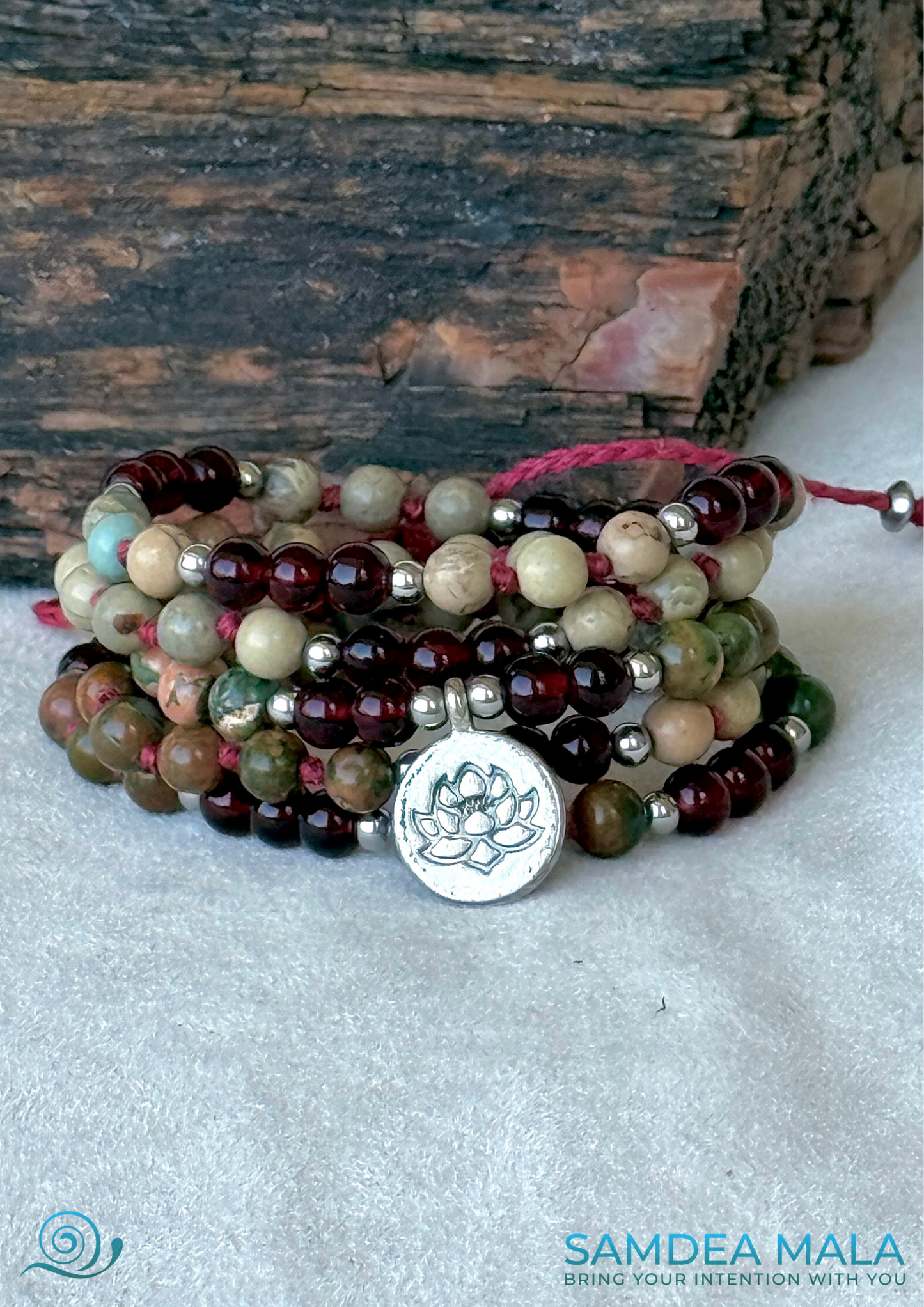 Multi round bracelet spiritual mala beads in garnet and jasper with small lotus charm