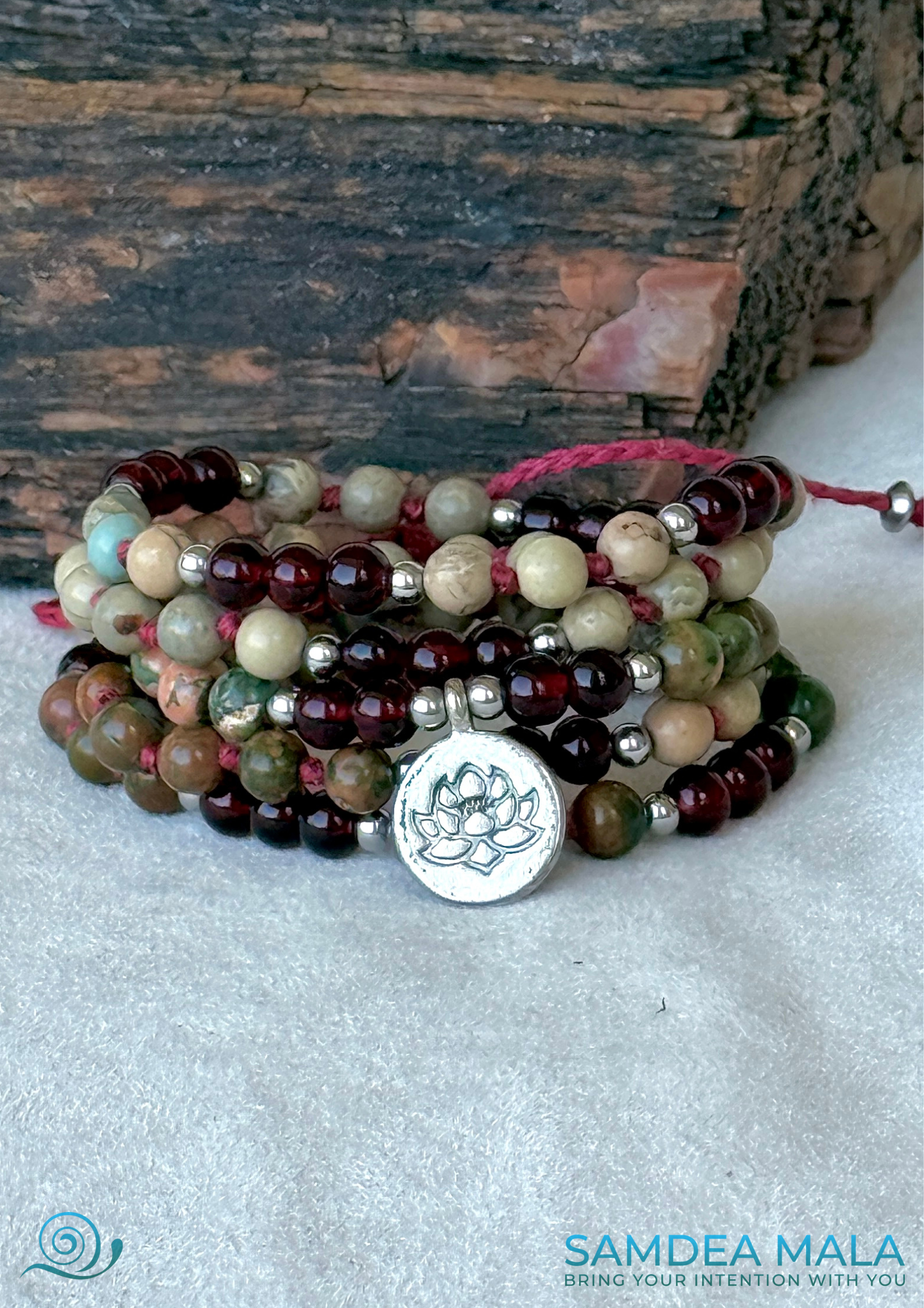 Multi round bracelet spiritual mala beads in garnet and jasper with small lotus charm