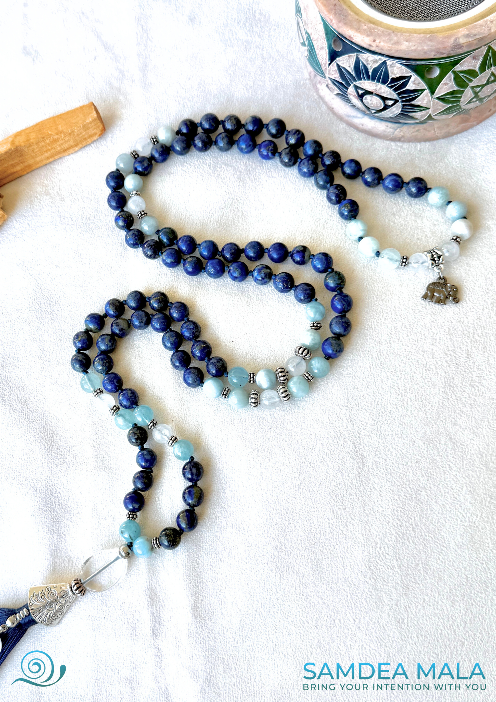 Samdea Mala for Libra zodiac sign in lapis lazuli, white jade, aquamarine, and clear quartz, hand knotted with natural stones zodiac sign in lapis lazuli, white jade, aquamarine, and clear quartz, hand knotted with natural stones