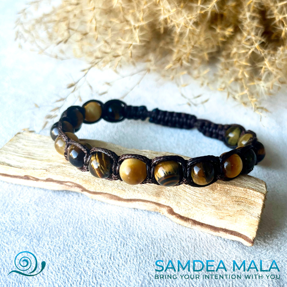 Samdea Mala – Tibetan-style in brown tiger eye gemstone bracelet with dark brown cord, for protection and abundance.