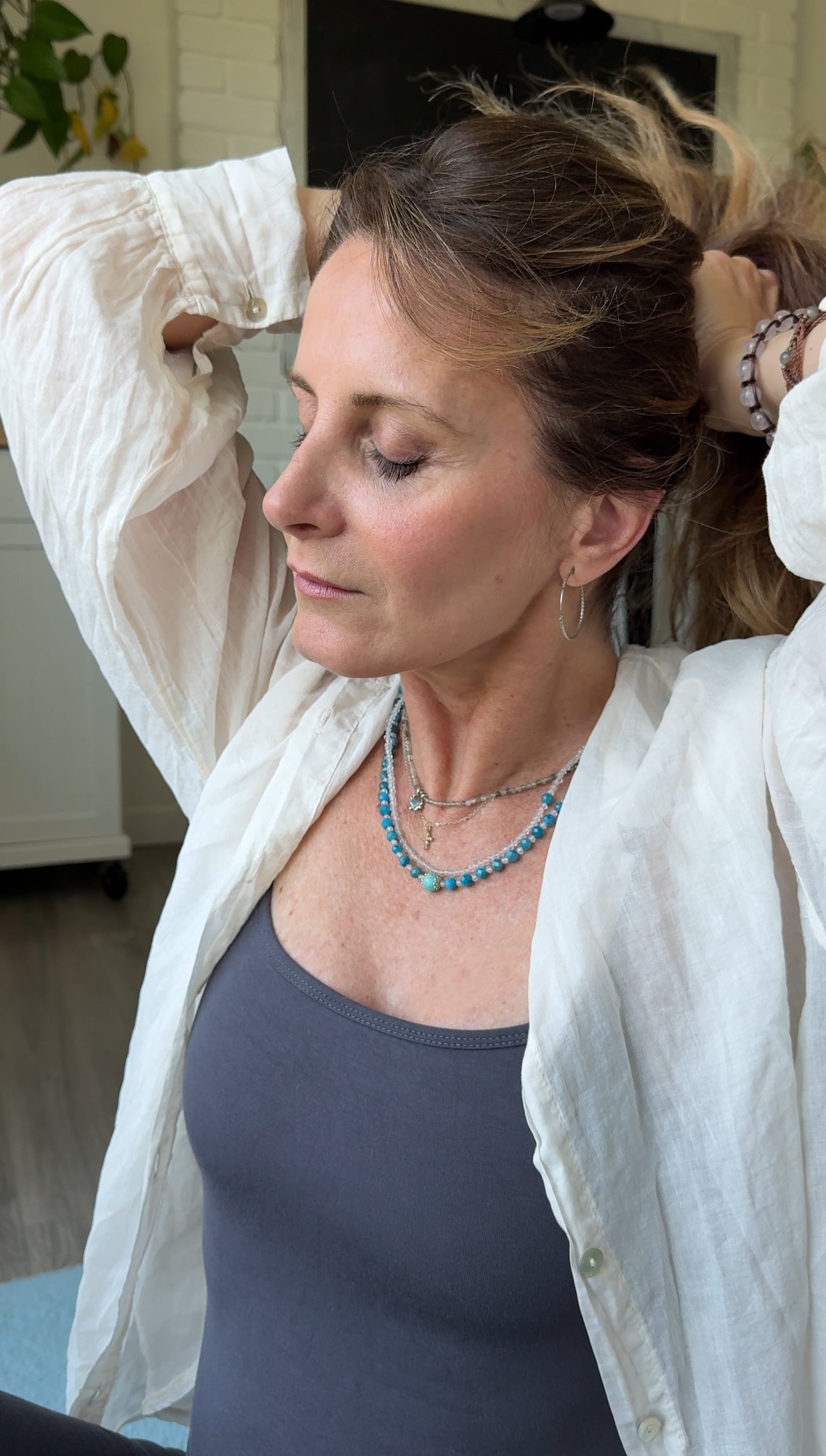 Worn Double strand gemstone choker in apatite, amazonite and quartz with sterling silver detail