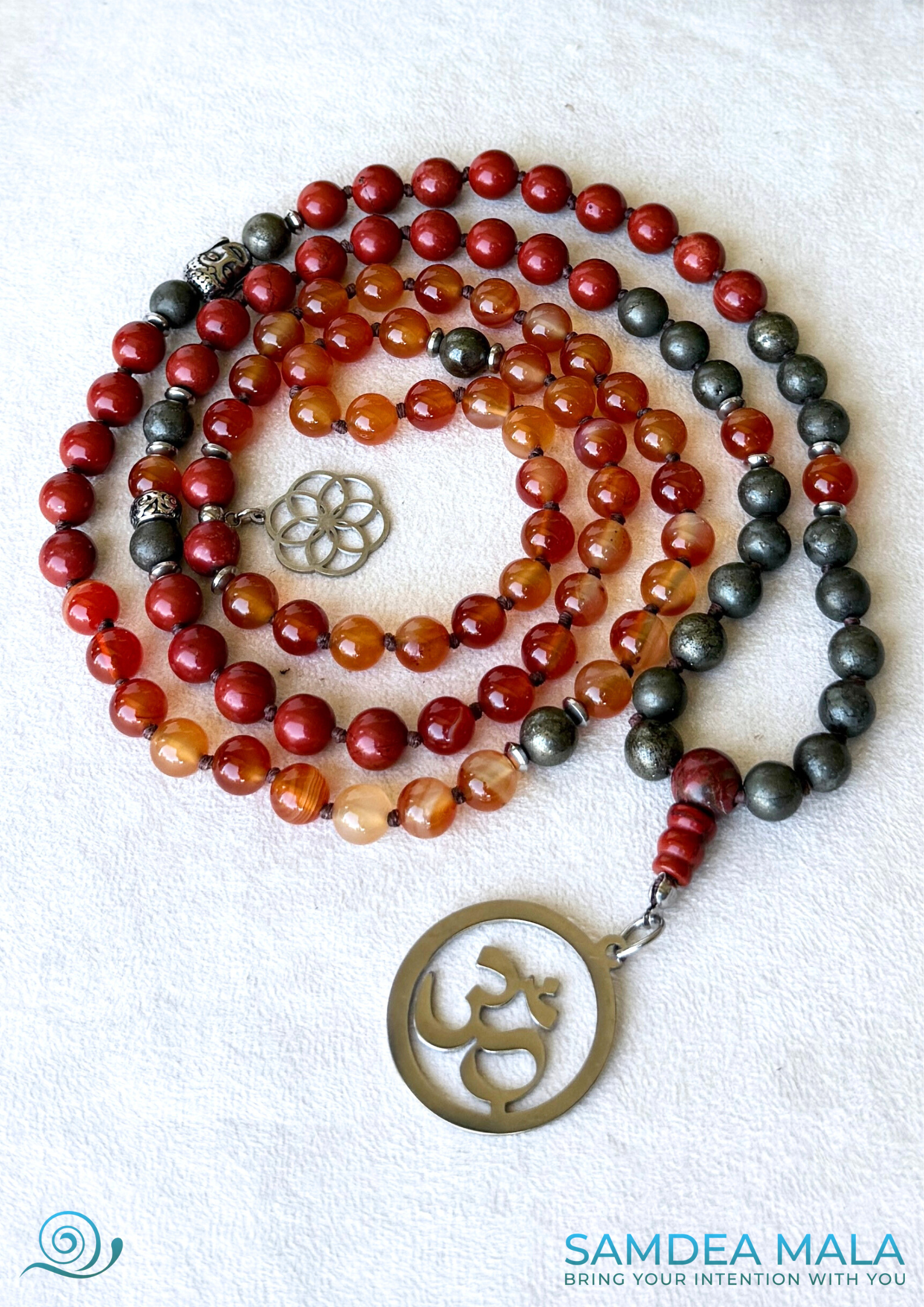 Grounding mala necklace for meditation, first chakra, with Om pendant, Red Jasper, Carnelian & Pyrite – for inner strength and mindful action. Includes Buddha charm and Flower of Life