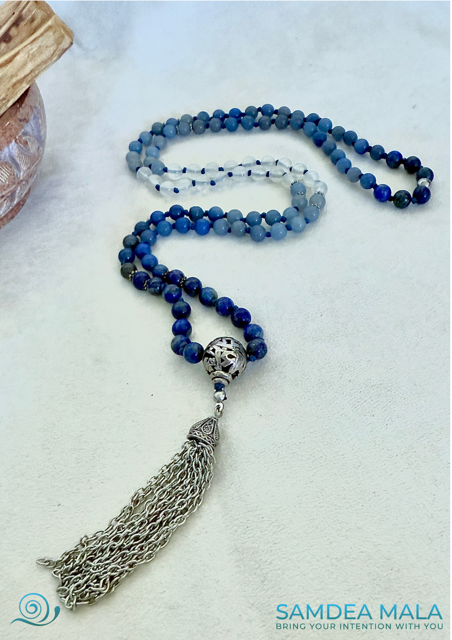 Hypoallergenic nickel- and lead-free alloy spacer detail on spiritual mala beads