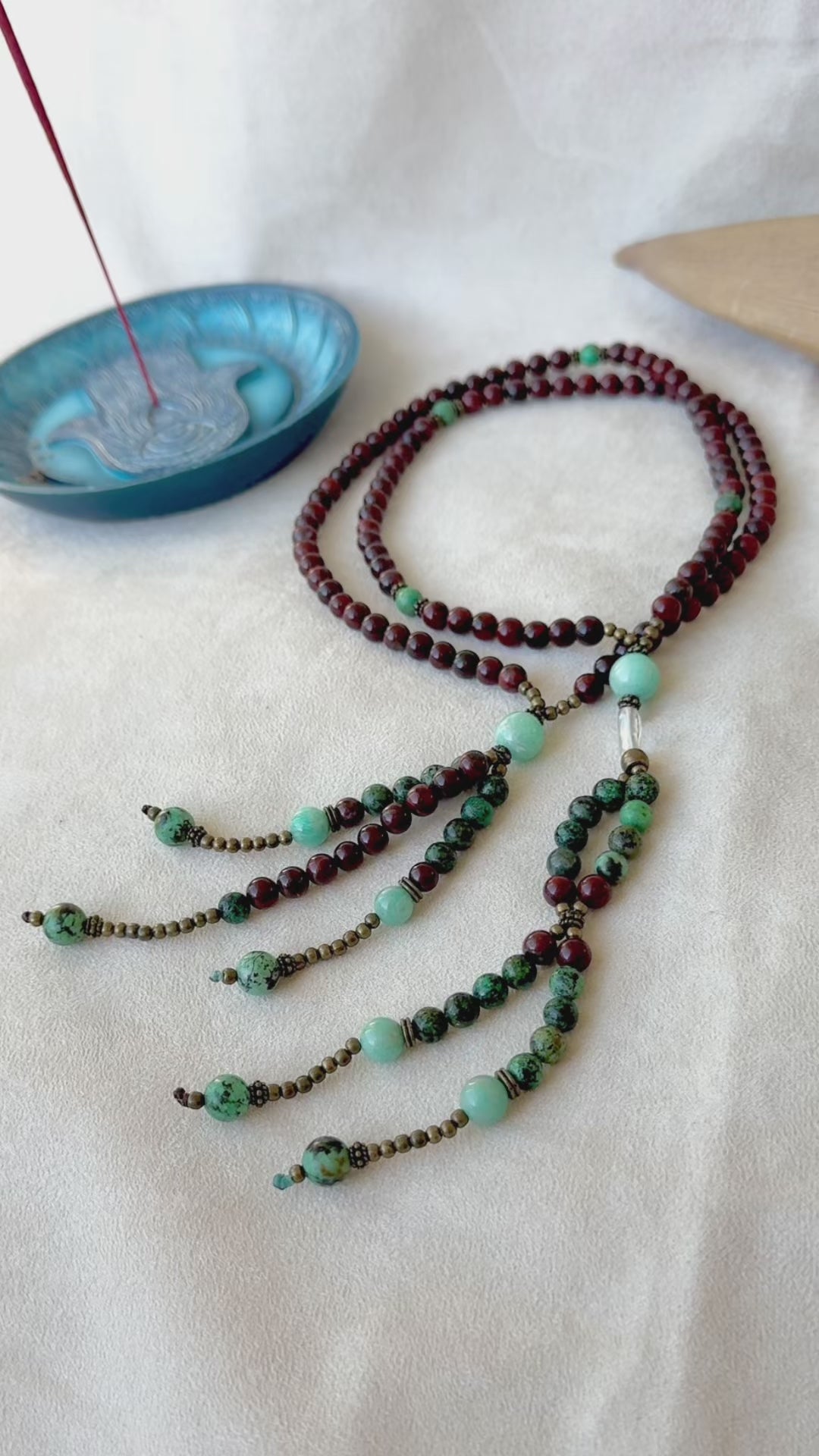 Video preview of Soka Gakkai Japanese Buddhist juzu, handmade prayer beads for Daimoku chanting and meditation. Nam Myoho Renge Kyo - with red jasper, turquoise jasper, amazonite, and clear quartz. Samdea Mala