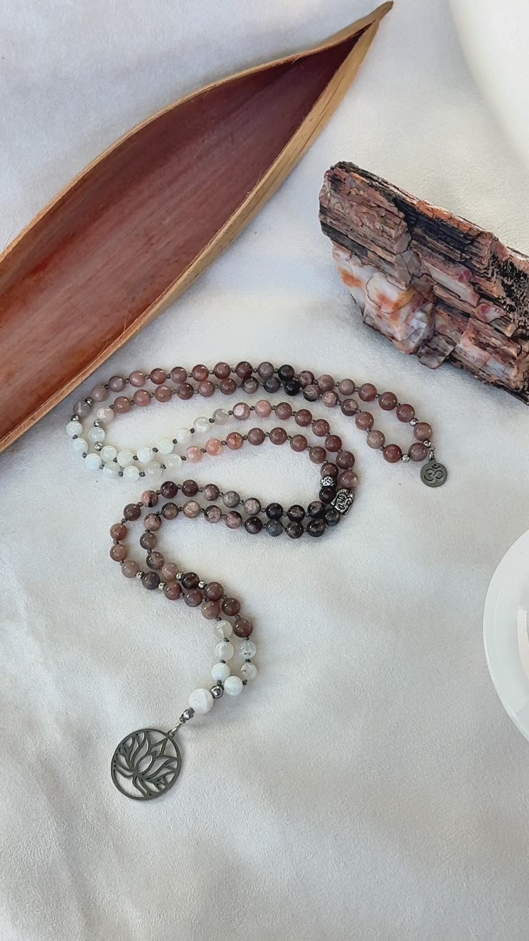 video of Moonstone Mala with Buddha – Hand-Knotted Feminine Energy Mala | Intuition Mala, 108 Beads for Self-Connection & Lunar Magic. Hand knotted, handcrafted in US. Moonstone mala necklace.