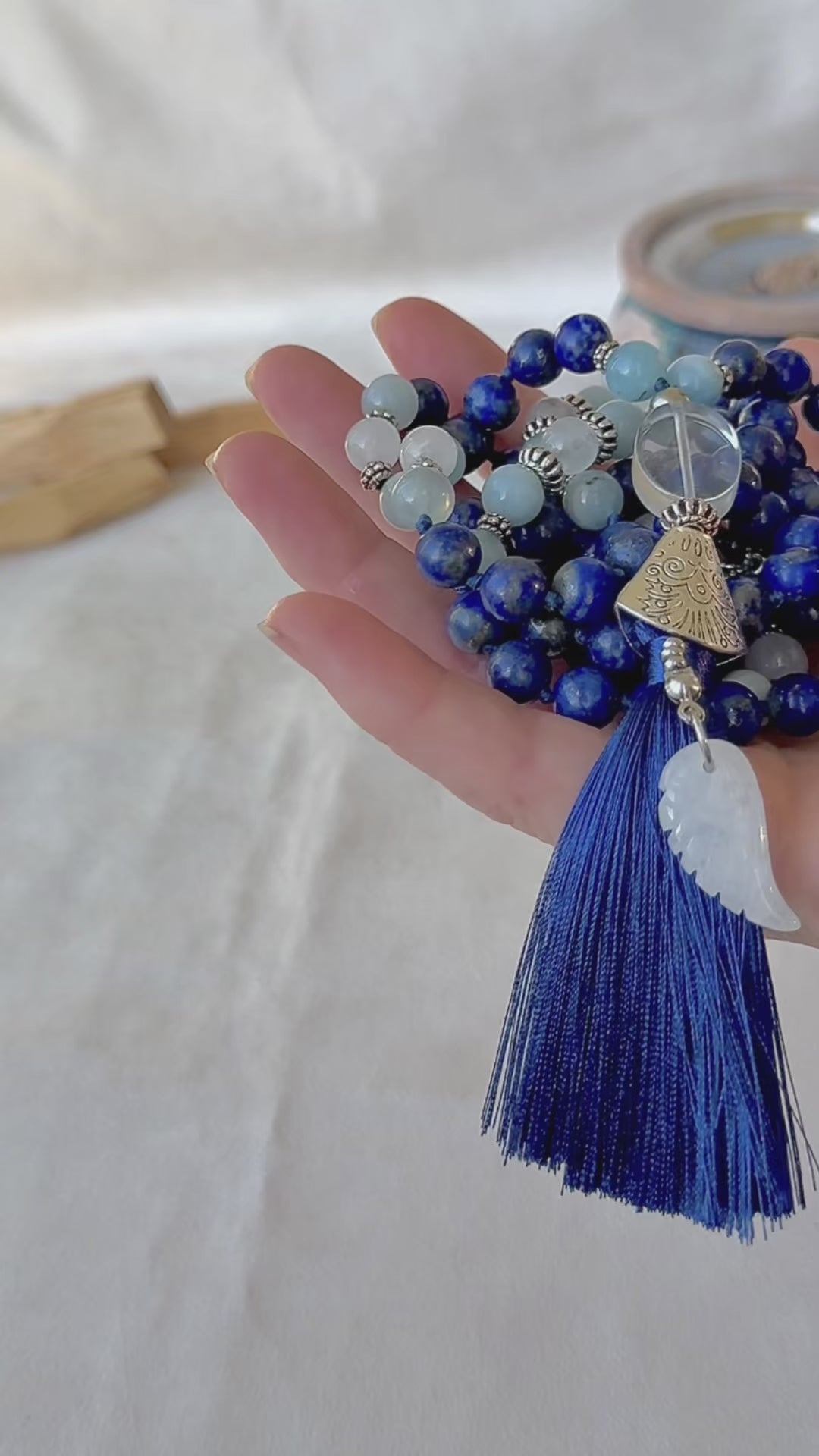 Video of Mala for meditation in lapis lazuli and aquamarina. Wisdom of the Sage – Piercing Illusion, Living Your Truth
