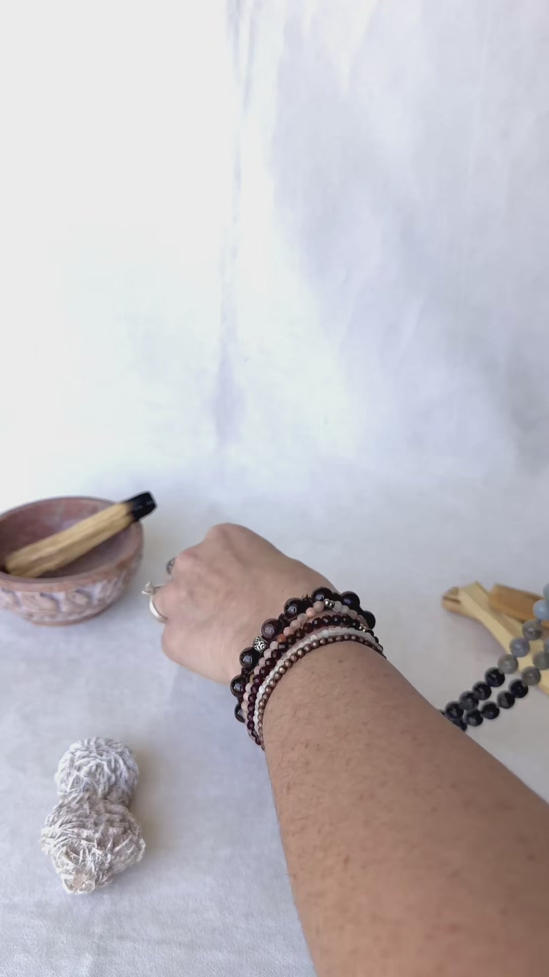 video Sacred Mala necklace in blue Aquamarine and grey Labradorite | Hand Knotted 108 Beads for Meditation and mindfulness - om charm - full view of mala for Aquarius zodiac sign