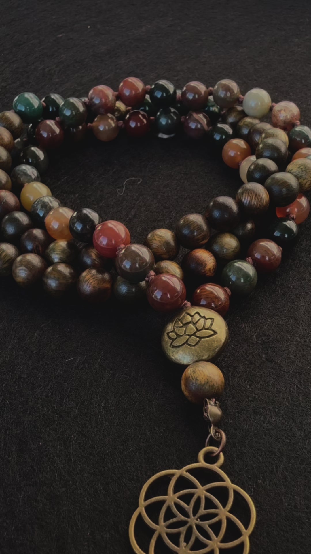 Video preview of Mala beads in Sandalwood and Indian Agate with seed o life pendant