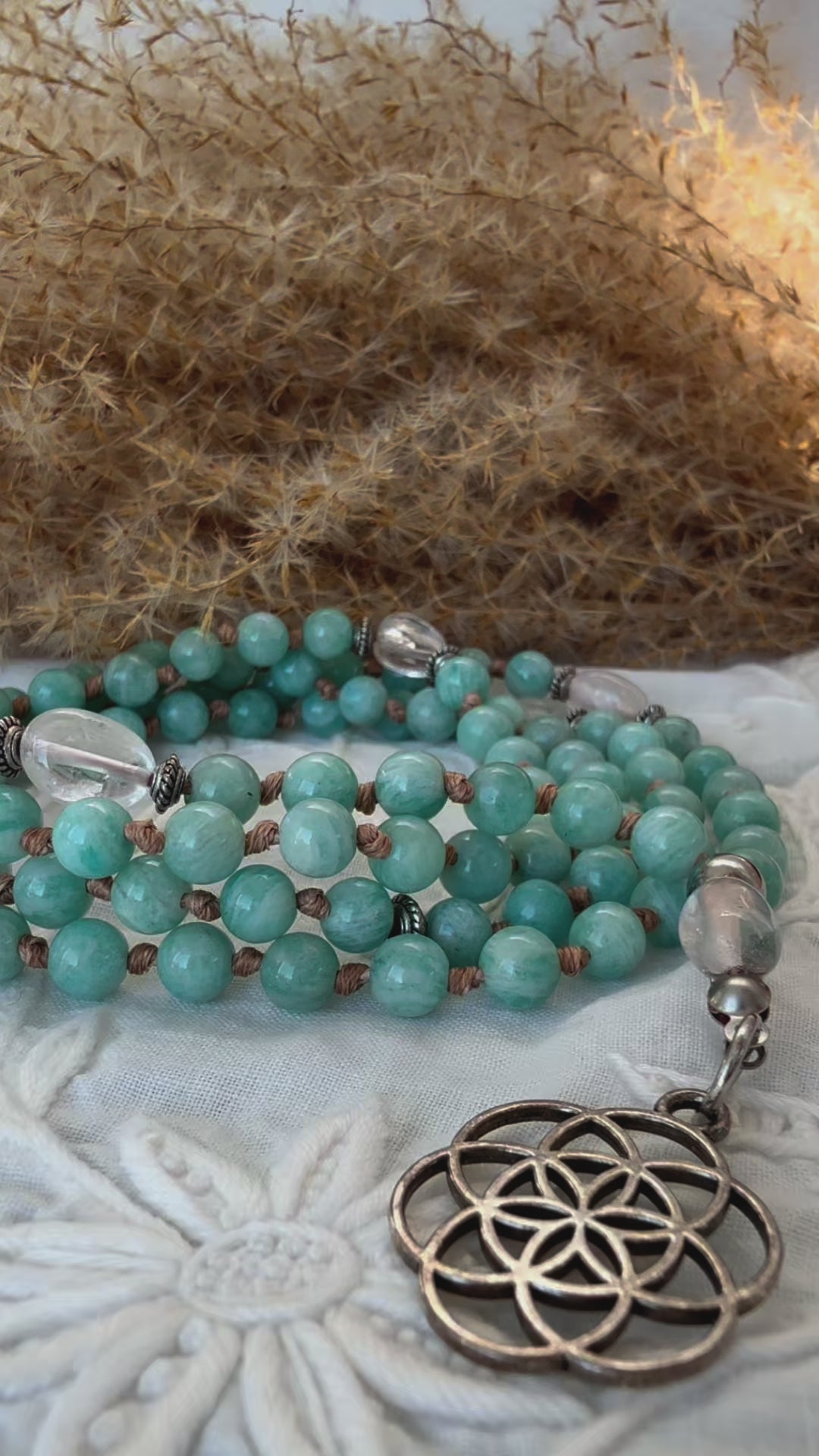 video preview of Amazonite Mala Beads Necklace Handmade – Mini Mala with Clear Quartz & Seed of Life Pendant - custom mala, tibetan mala, energy crystals, spiritual mala, natural gemstones mala with seed of life pendant - Samdea Mala