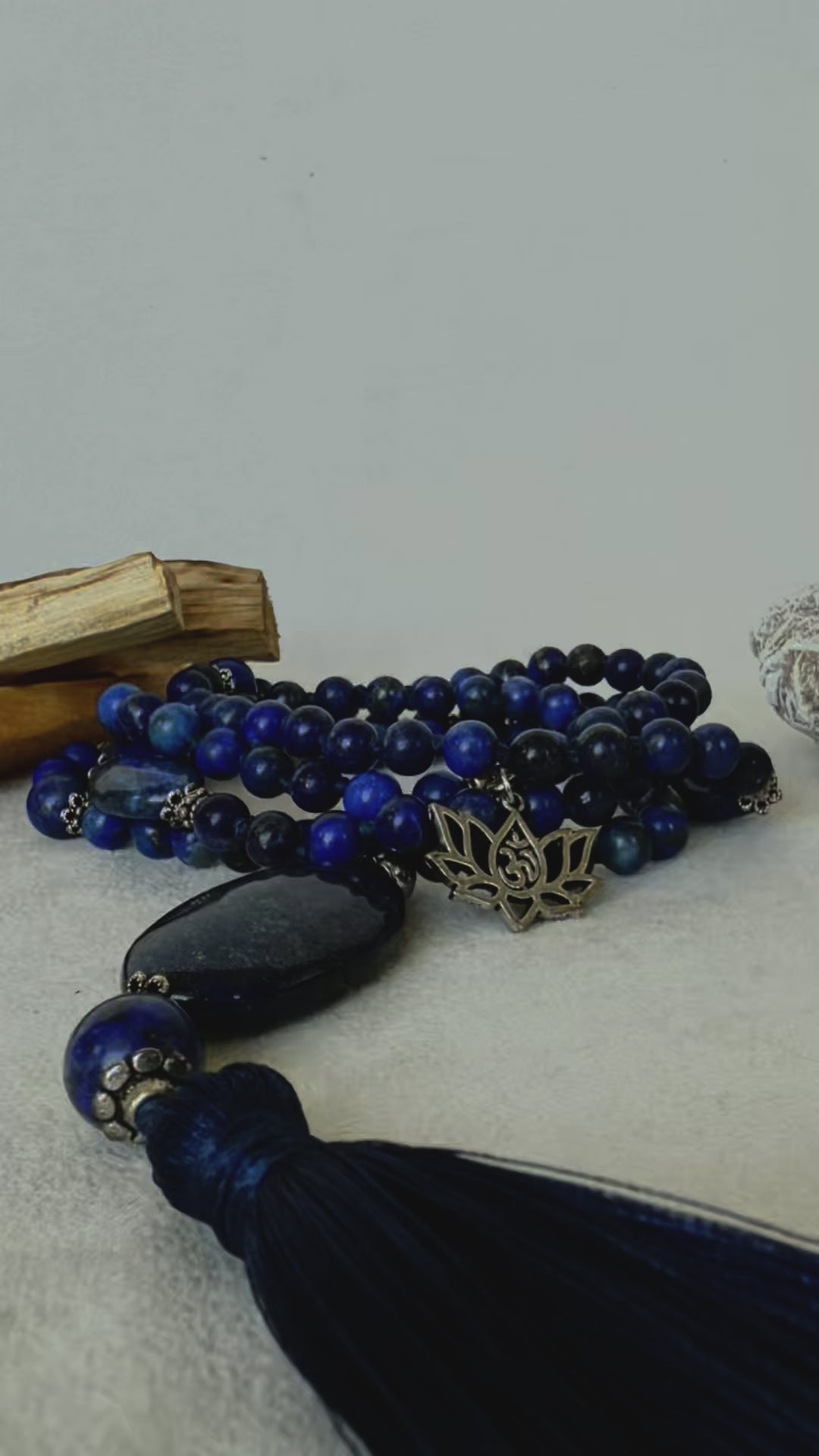 Video preview of mala necklace, 108 traditional mala in lapis lazuli, blue spiritual prayer beads with tassel and small lotus charm