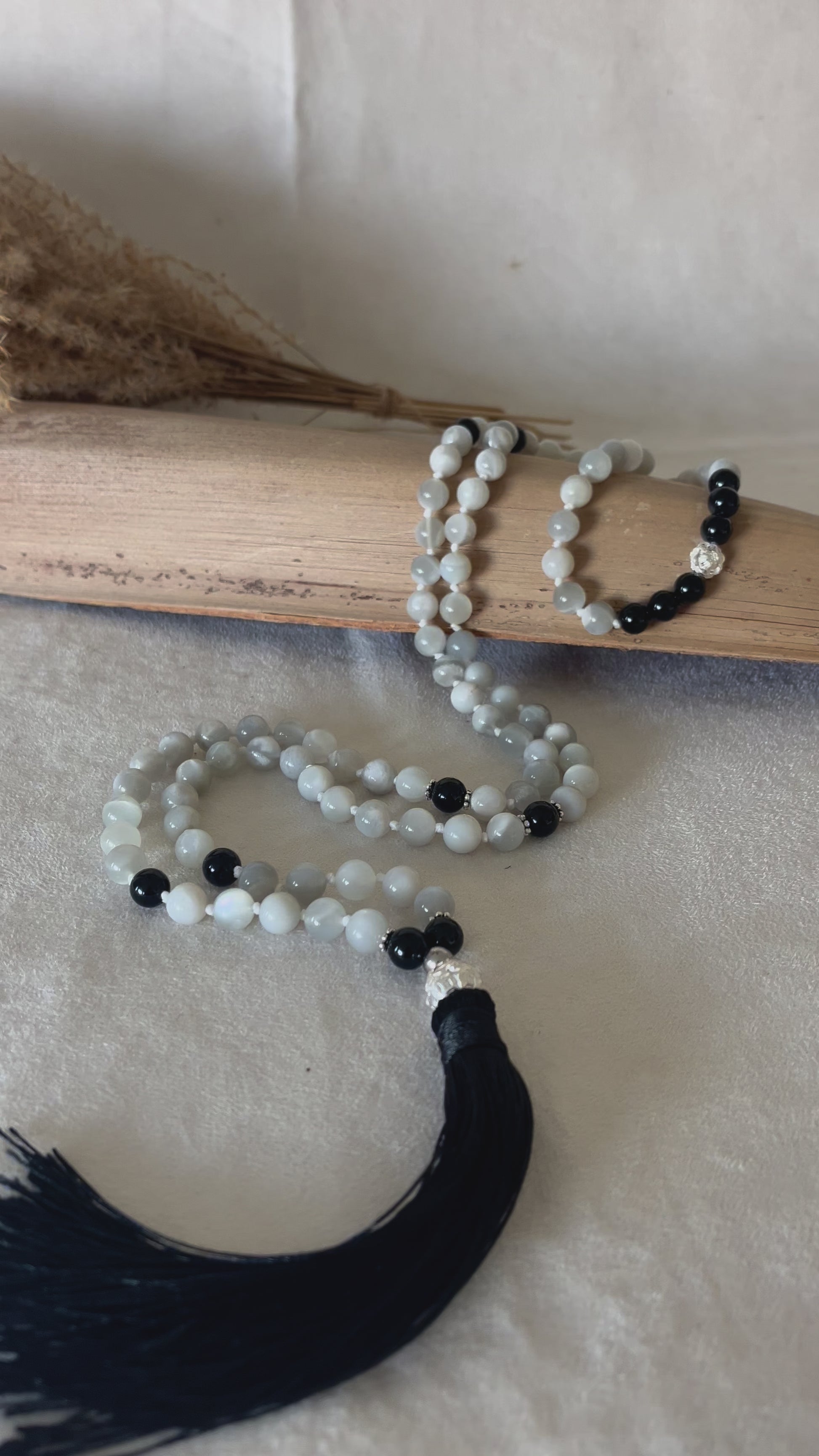 Video preview of of Sri Lanka moonstone and black tourmaline for protection – luminous beads for emotional balance
