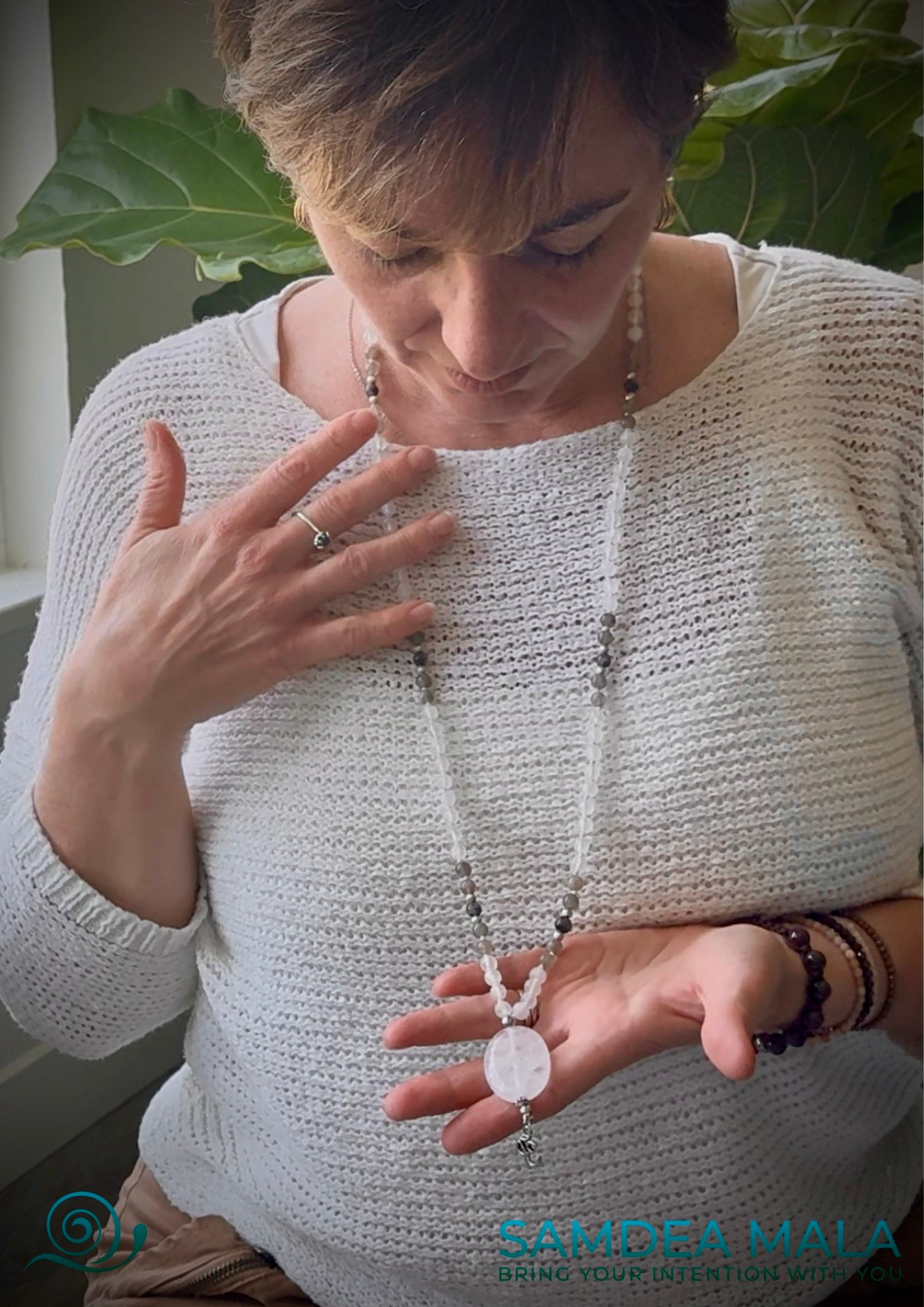 worn mala beads in Selenite, Labradorite and Clear Quartz - Samdea Mala with selenite, labradorite, and clear quartz for protection and clarity. 108 prayer beads mala necklace. Custom Mala for Meditation and protection.
