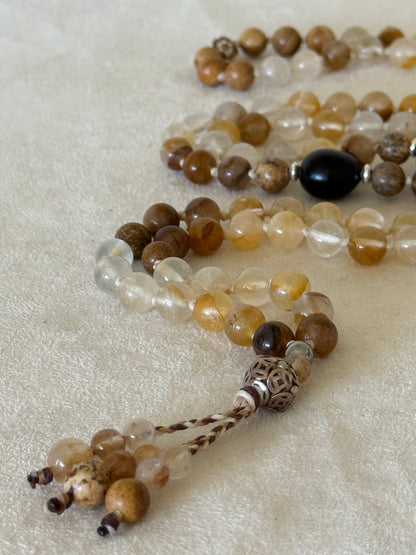 One-of-a-kind 108 bead hematoid quartz and sand jasper mala with soapberry seeds and sterling silver details, handmade by Samdea