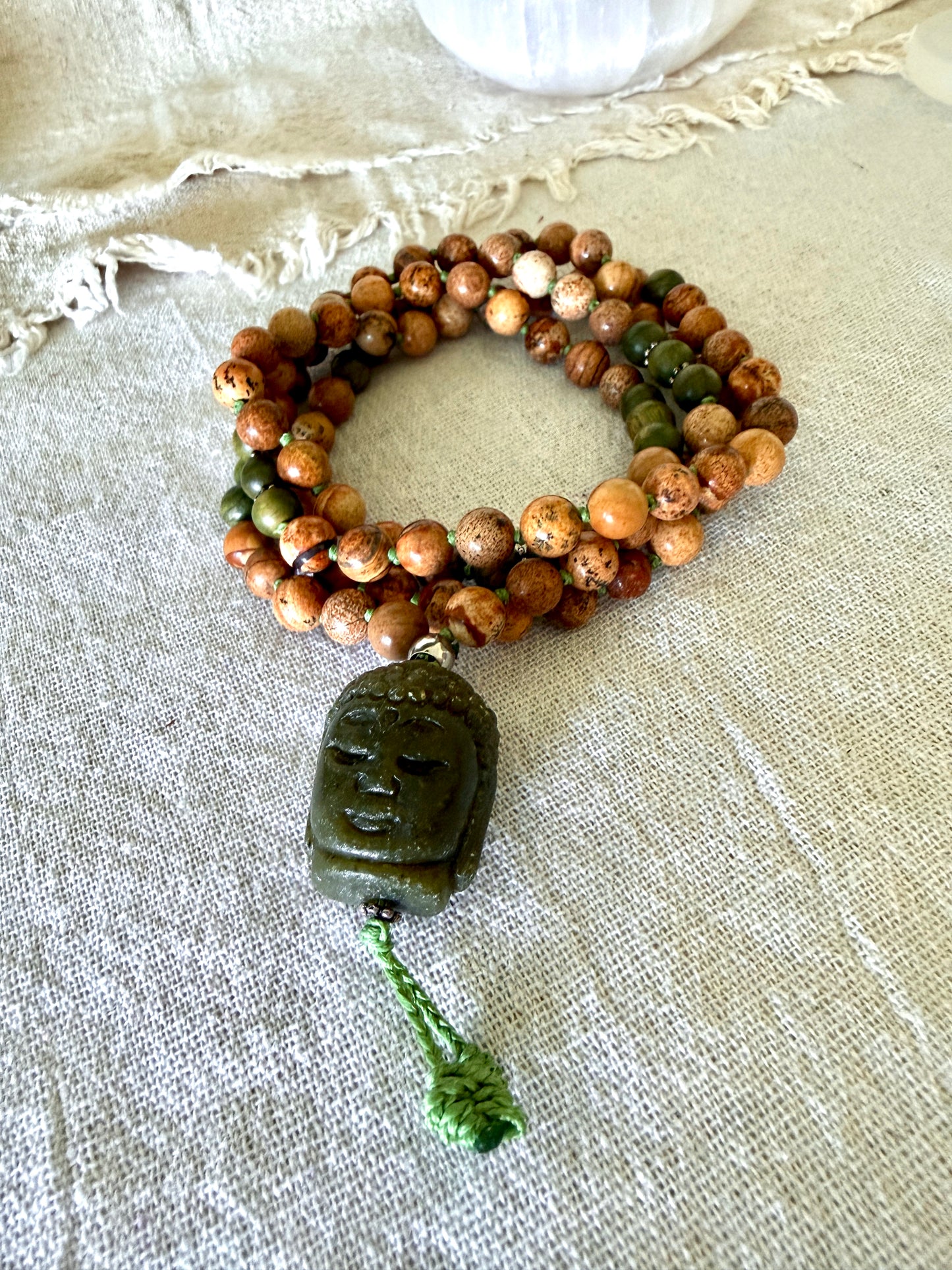 108 bead mala for meditation with genuine sandalwood, sand jasper gemstones, and Jade Buddha pendant