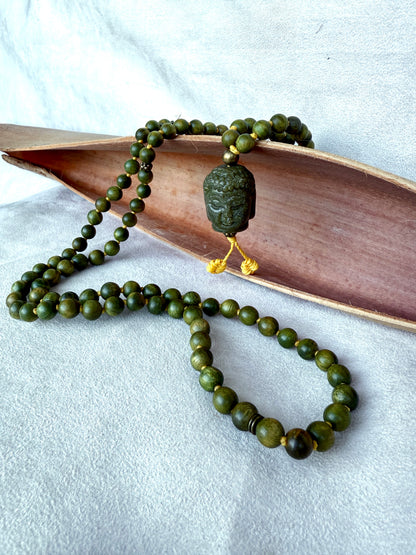 Sandalwood Mala Beads with Green Jade Buddha Pendant for Abundance on a Sandalwood Mala for meditation and midfulness
