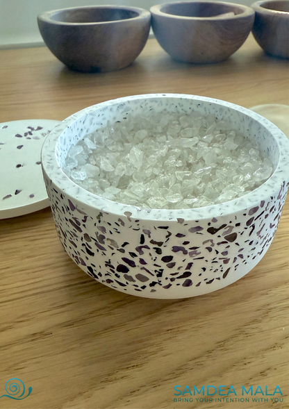 Amethyst and quartz crystal bowl for recharging spiritual jewelry and bracelets