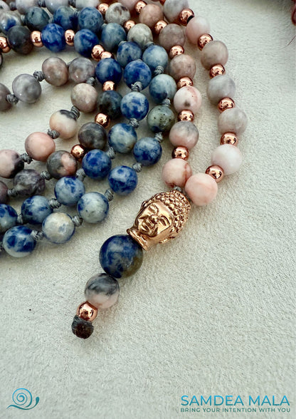 Buddha charm on a mala for meditation in blue and pink colours - handmade, 100% natural stones
