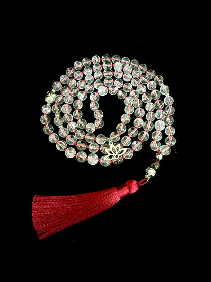 Full View Clear quartz 108 bead mala On mani Pamde Hum, with garnet guru bead, lotus charm, and deep red  thread and red tassel. Handmade Mala for meditation. Custom mala beads, Hand-knotted prayer beads necklace.
