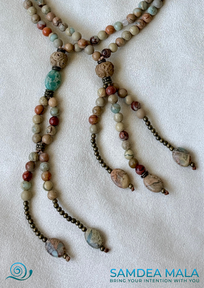 Close-up pf tassels of handmade Buddhist prayer beads. Japanese-style Juzu with tassels and natural stones. 