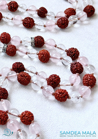 Detail of Hand knotted mala beads with rudraksha seeds and quartz gemstones