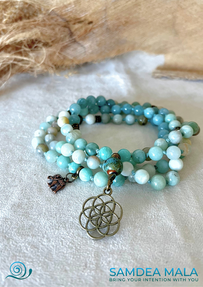 Example of a completed Guru Mala, personalized with hand-selected natural gemstones