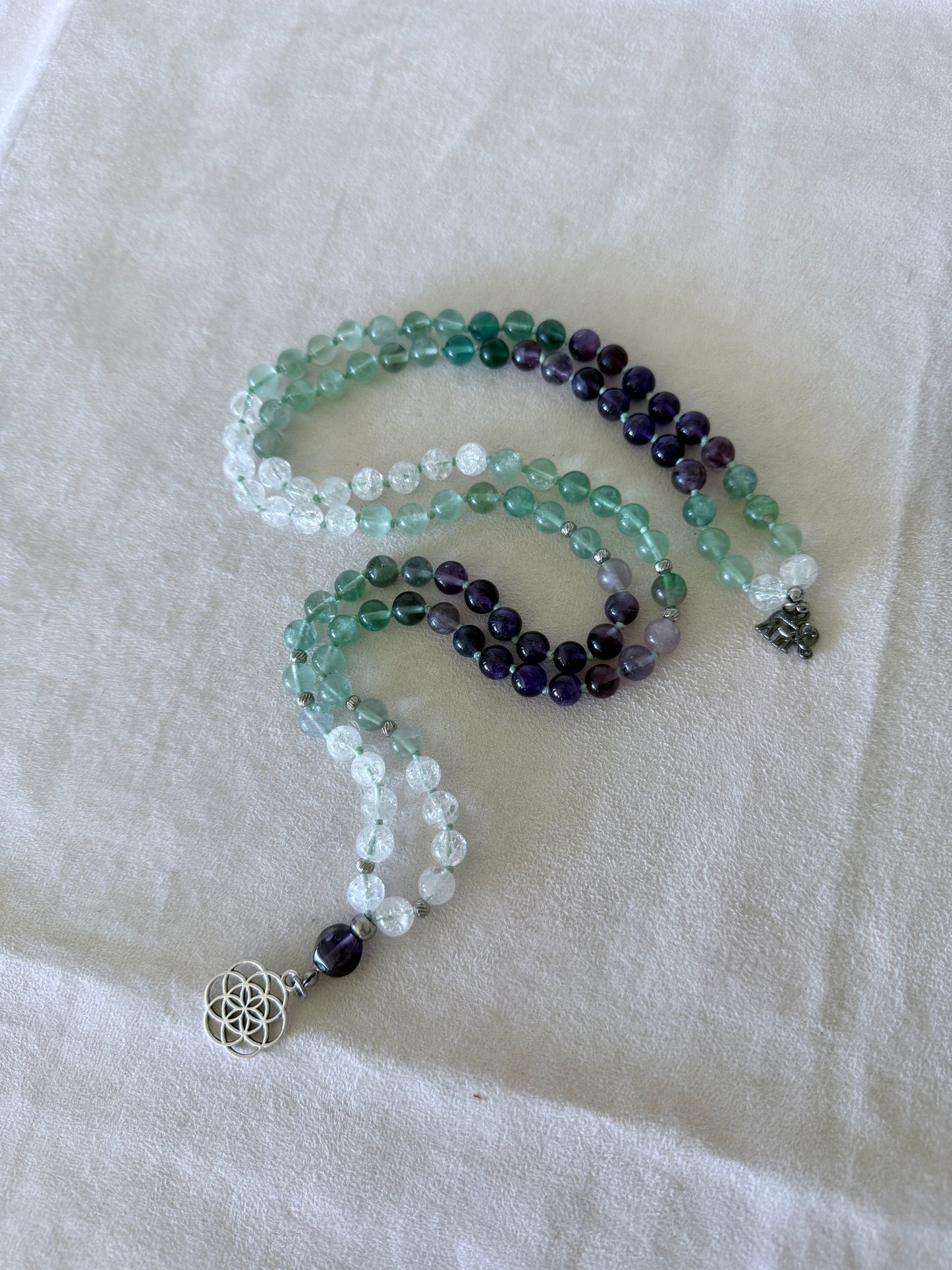 Samdea Mala necklace with green fluorite, amethyst and clear quartz 108 prayer beads with Seed of Life pendant full view