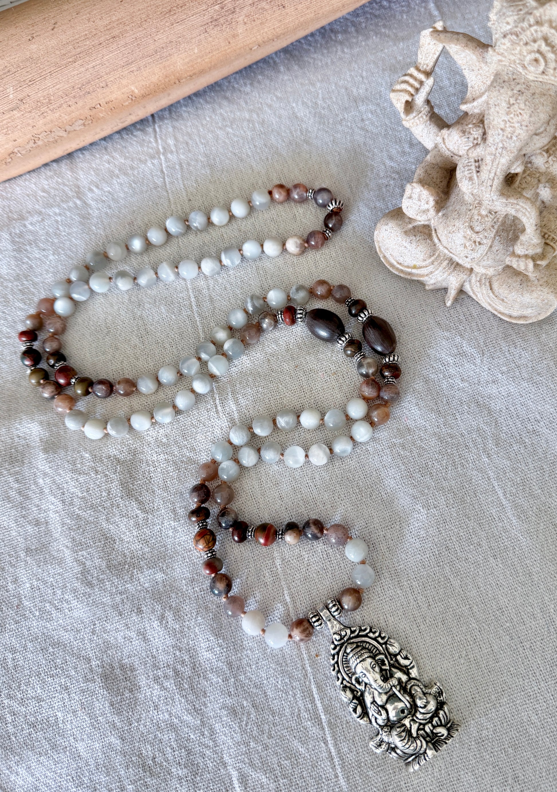 Full view of Ganesha mala necklace with natural gray moonstone from Sri Lanka and black moonstone for meditation